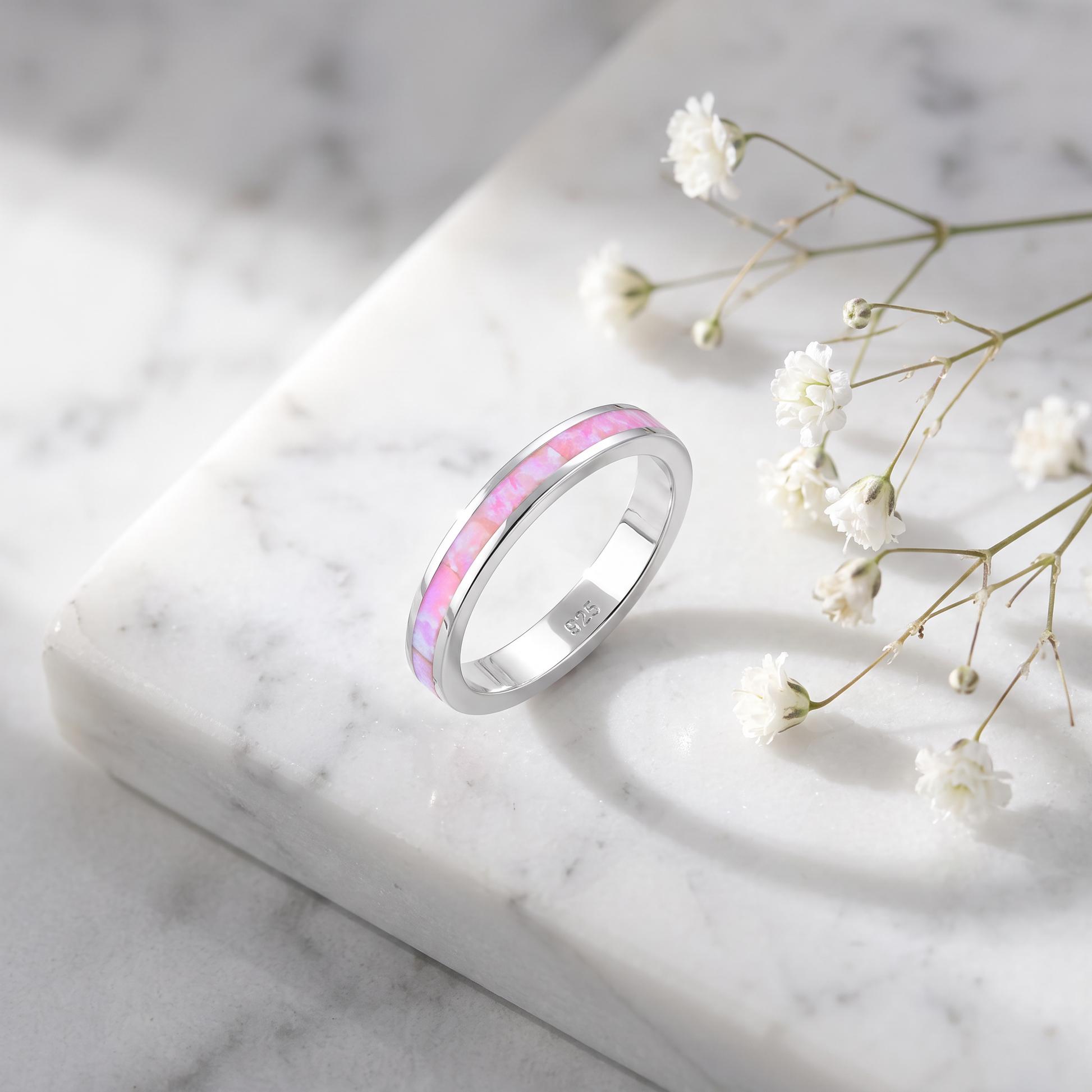 Sterling Silver Seamless Pink Lab Opal Ring on marble