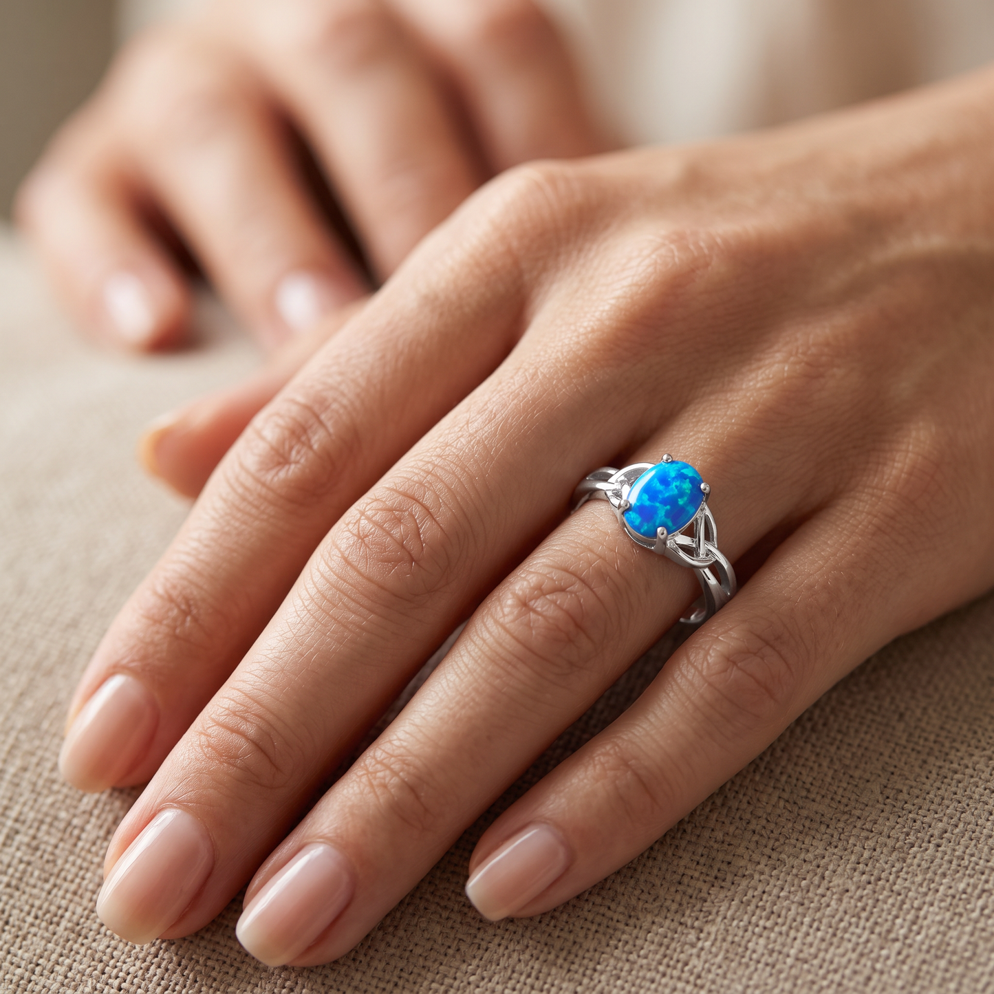 Sterling Silver Gold Plated Center Stone Charmed Blue Lab Opal Ring worn on hand