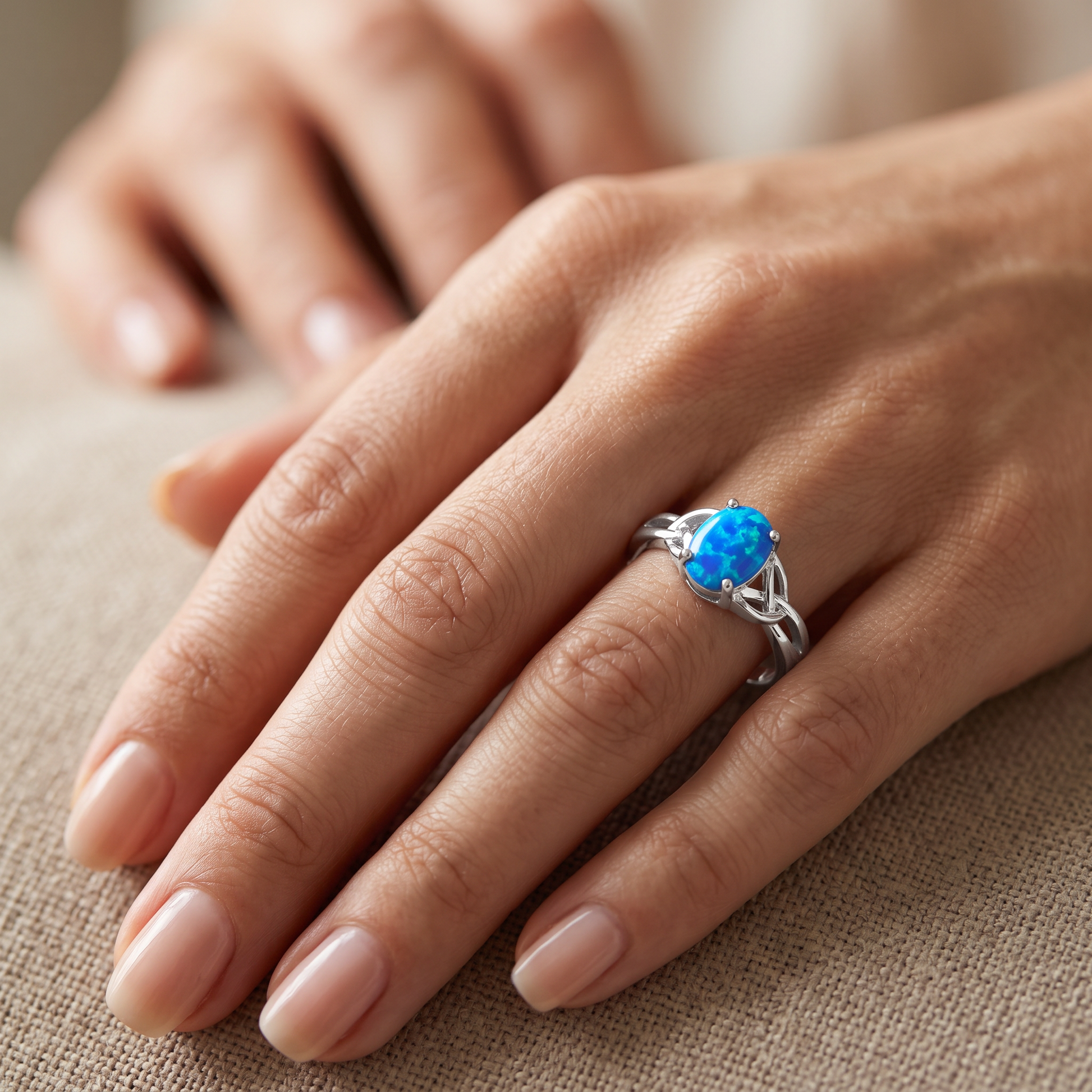 Sterling Silver Gold Plated Center Stone Charmed Blue Lab Opal Ring worn on hand