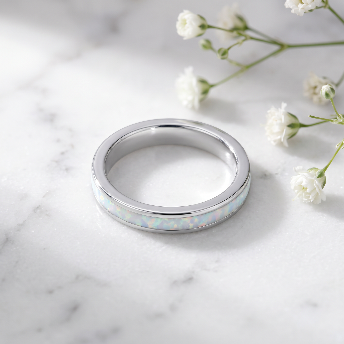Sterling Silver Rose Gold Seamless White Lab Opal Ring on marble