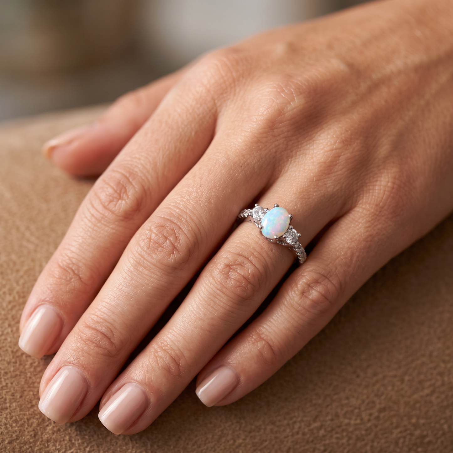 Sterling Silver Rose Gold Oval White Lab Opal CZ Ring worn on hand