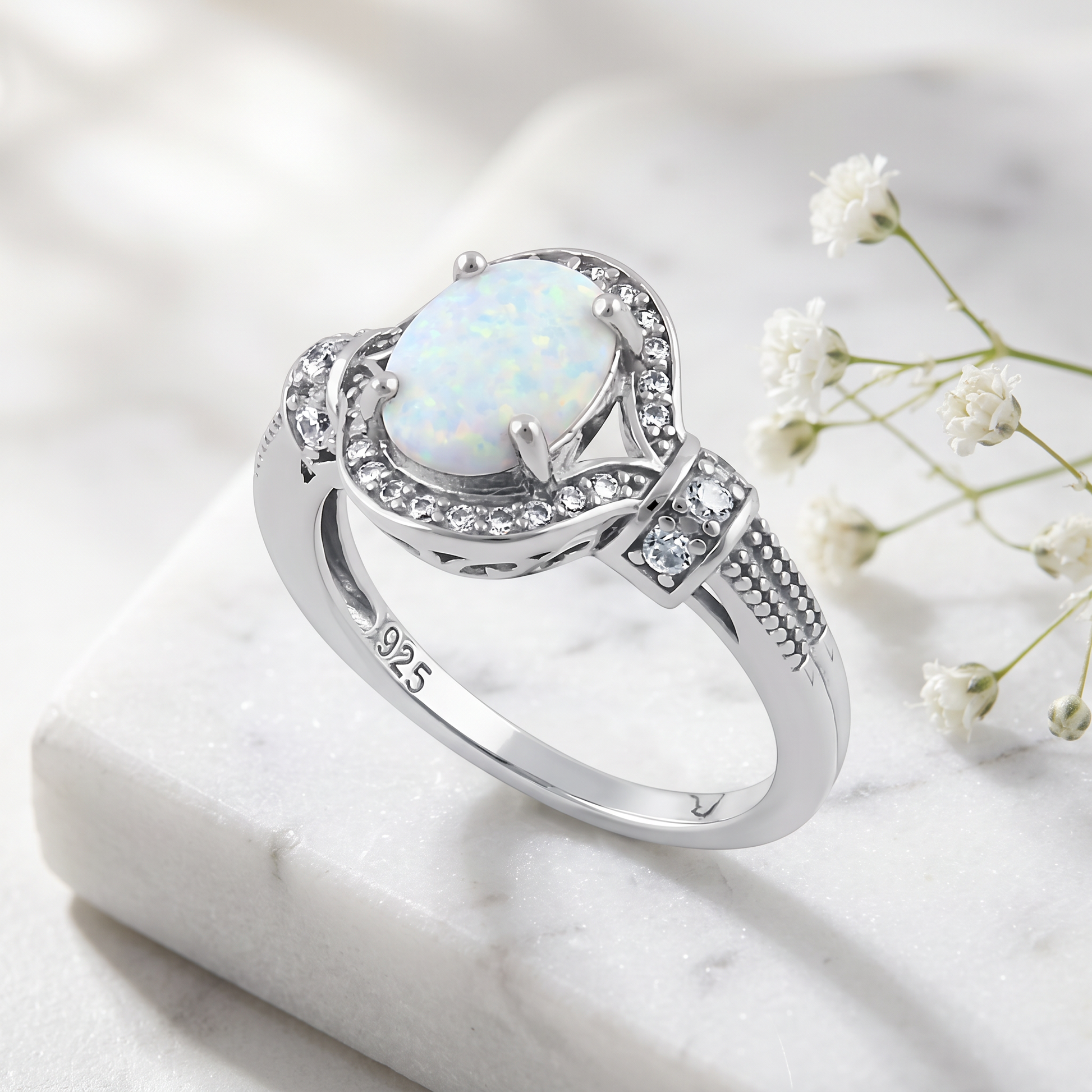 Sterling Silver Rose Gold Elegant White Oval Lab Opal CZ Ring on marble