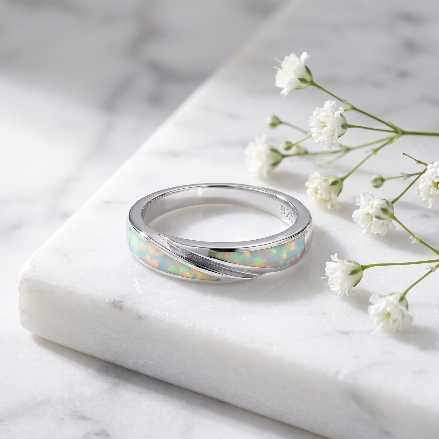 Sterling Silver White Lab Opal Band Ring on marble