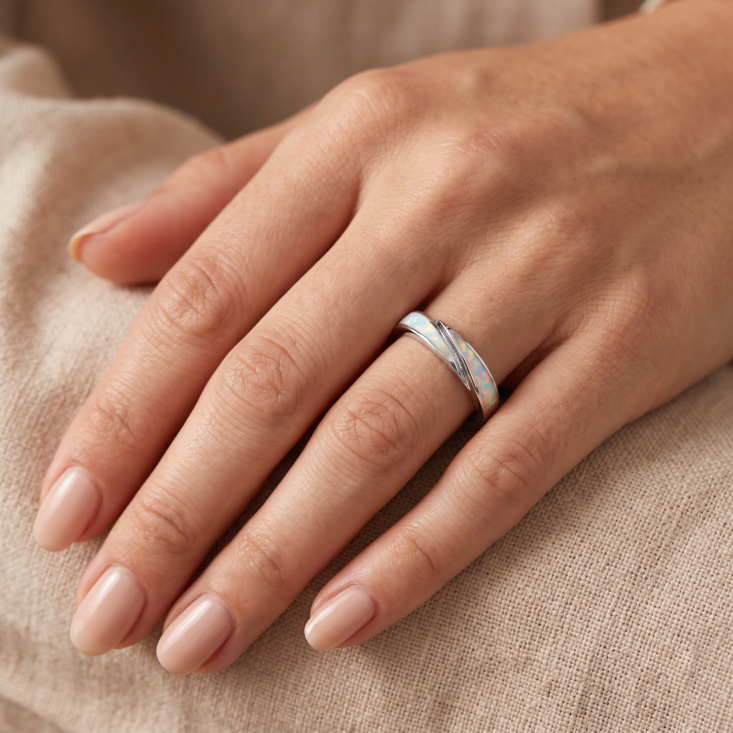 Sterling Silver White Lab Opal Band Ring worn on hand