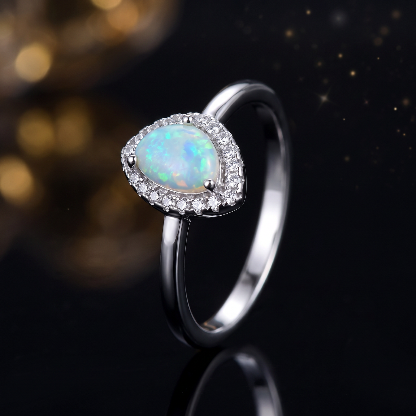 Sterling Silver White Lab Opal Tilted Pear Halo CZ Ring close-up