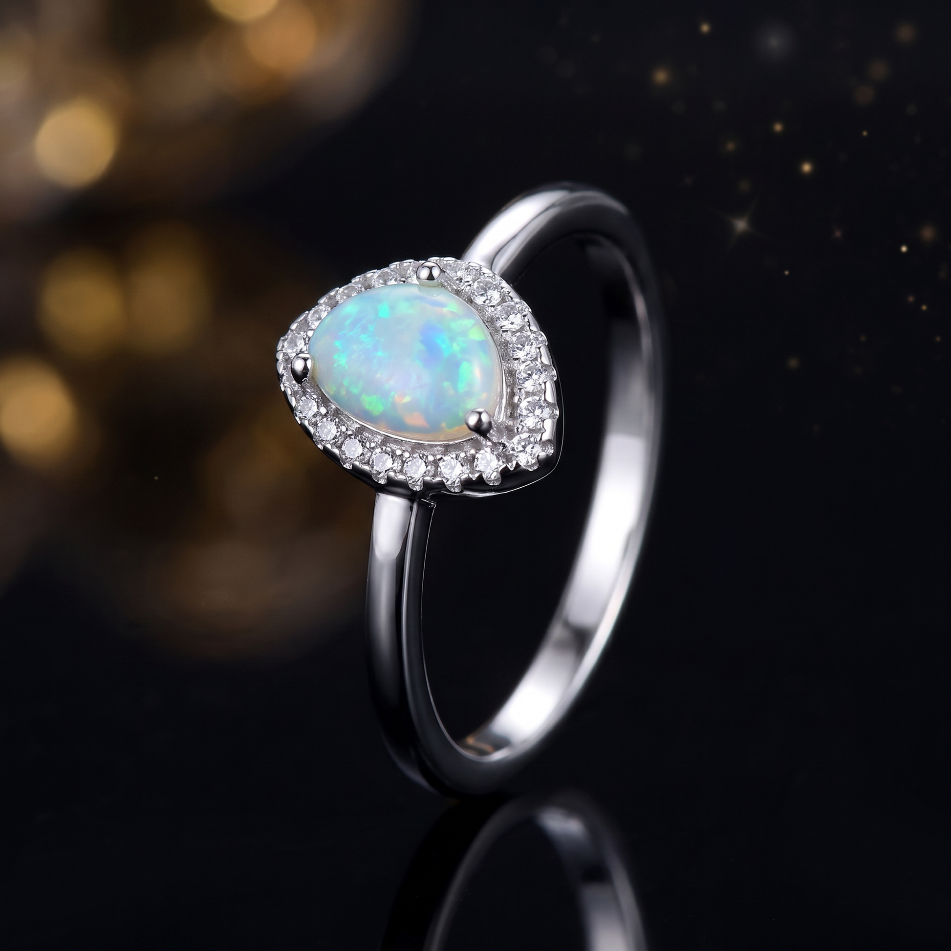 Sterling Silver White Lab Opal Tilted Pear Halo CZ Ring close-up