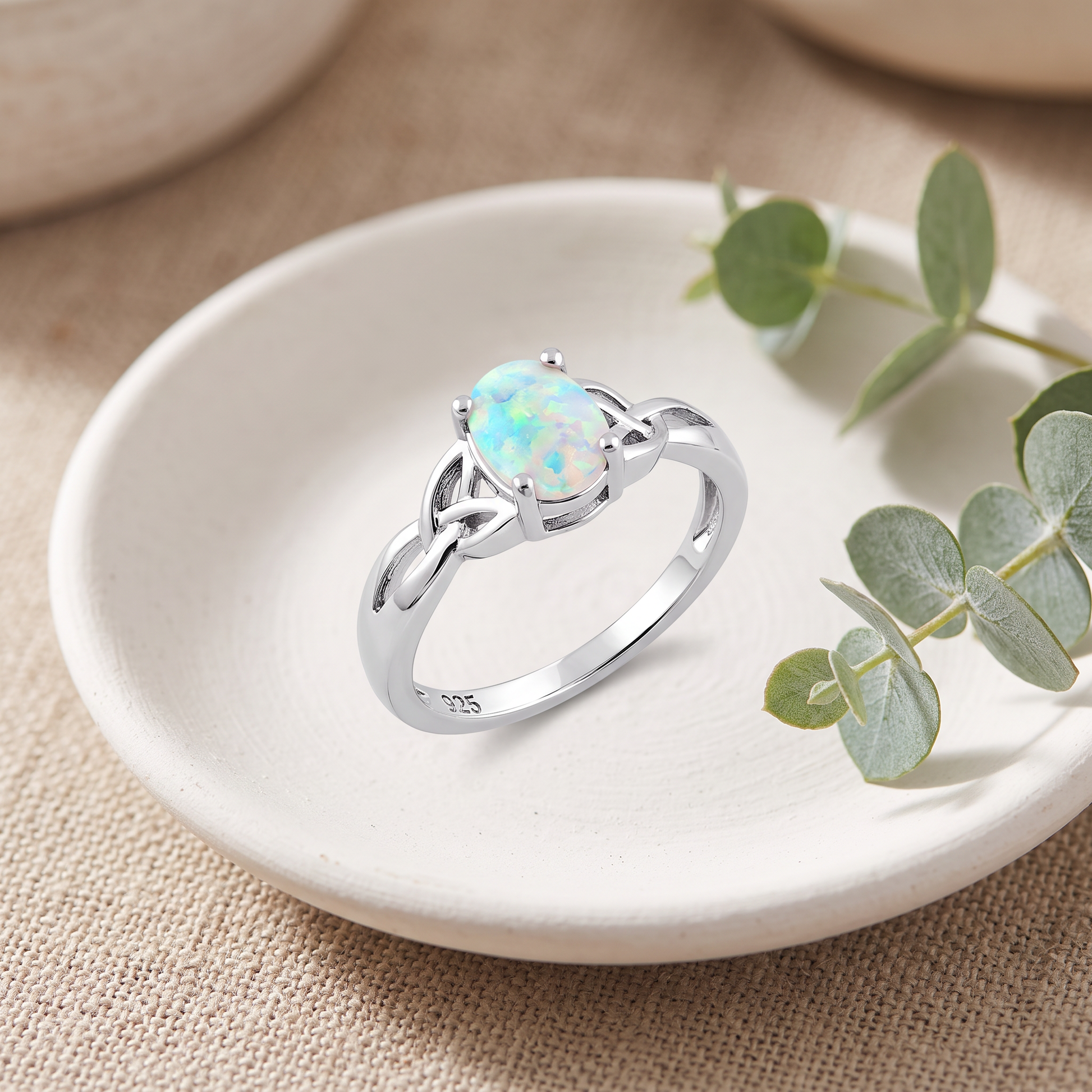 Sterling Silver Oval Celtic White Lab Opal Ring styled