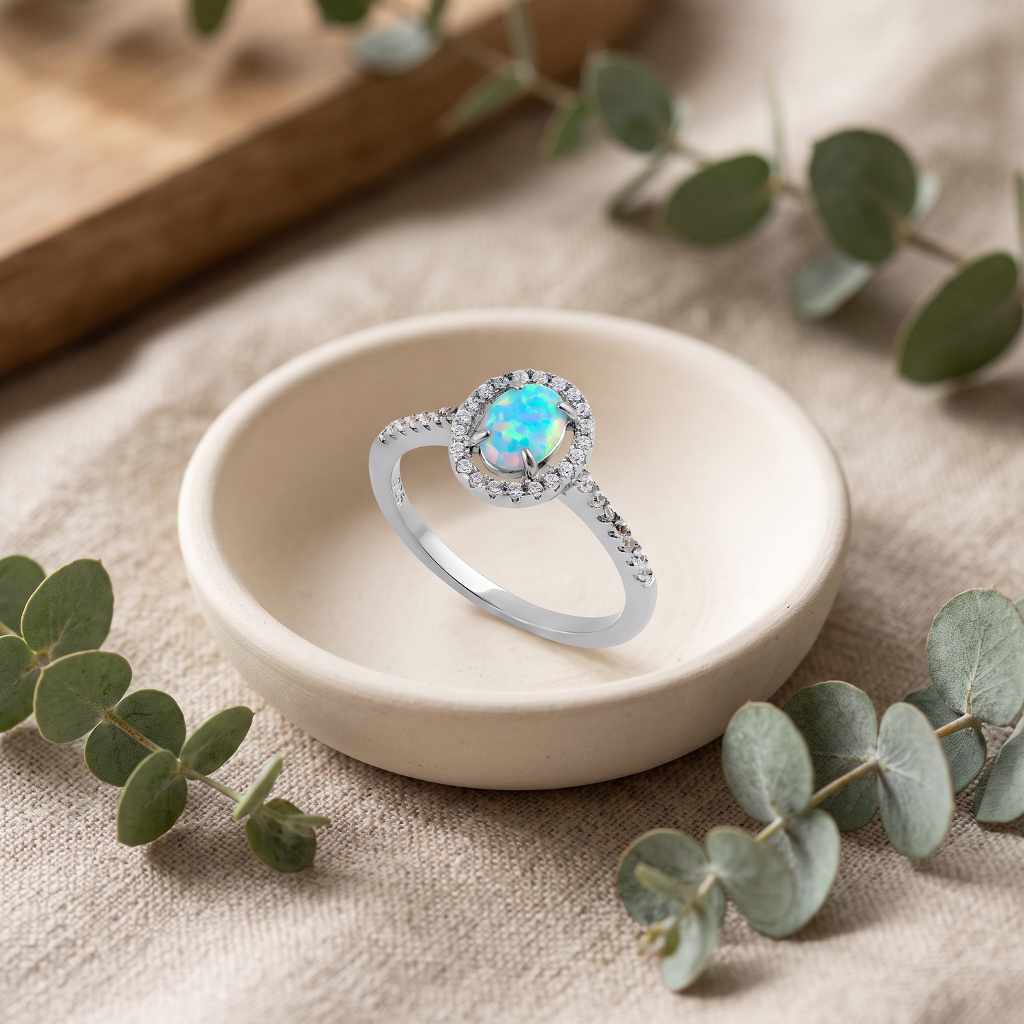 Sterling Silver White Lab Opal and Clear CZ Oval Halo Ring styled