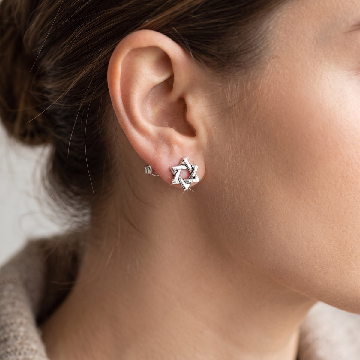 Star of David (Jewish Star) Stud Earrings Sterling Silver - 7mm worn, lifestyle photo