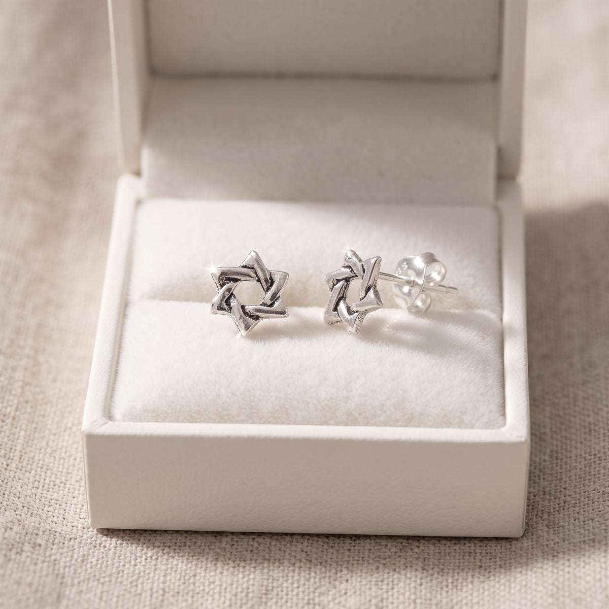 Star of David (Jewish Star) Stud Earrings Sterling Silver - 7mm in a white gift box, ready to give