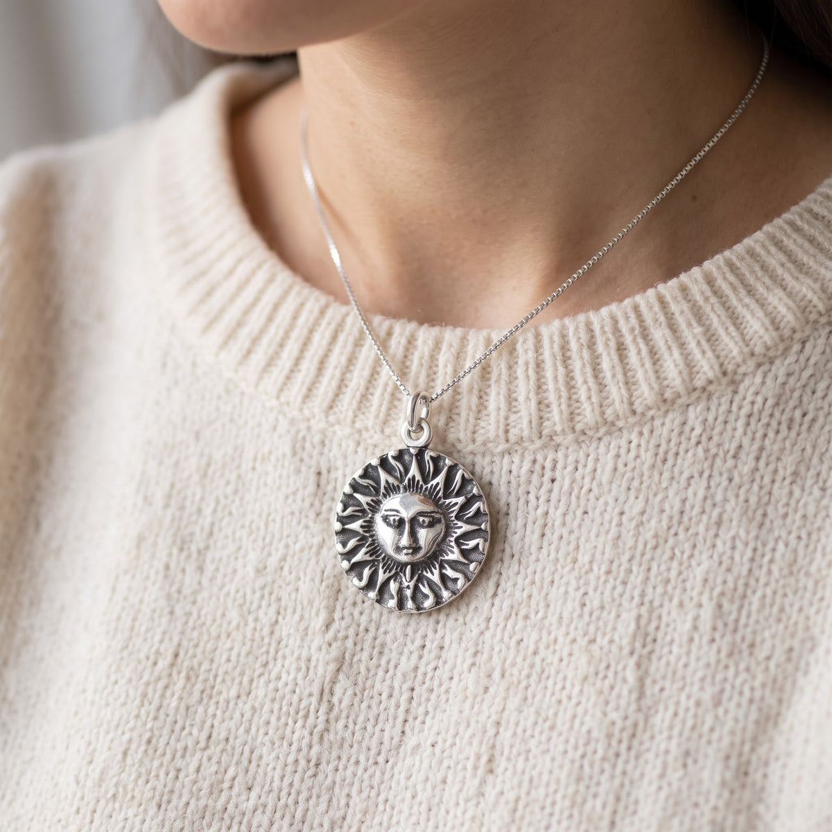 Sterling Silver Aztec Sun Necklace, 18" worn, lifestyle photo