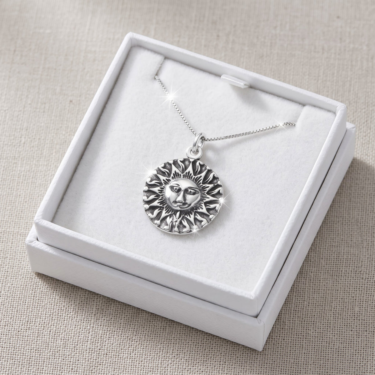 Sterling Silver Aztec Sun Necklace, 18" in a white gift box, ready to give