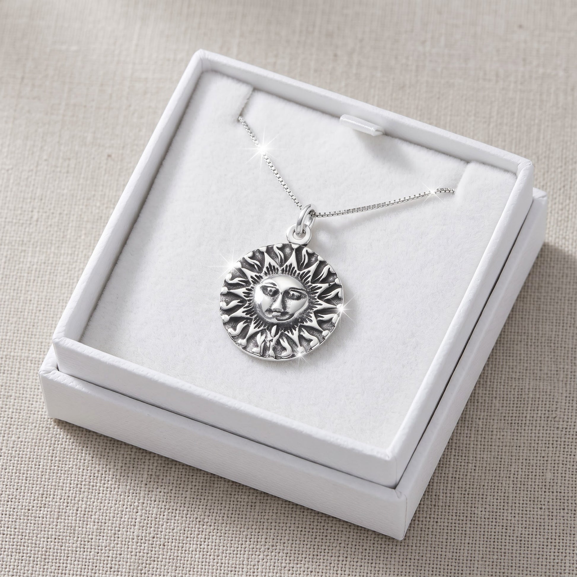 Sterling Silver Aztec Sun Necklace, 18" in a white gift box, ready to give