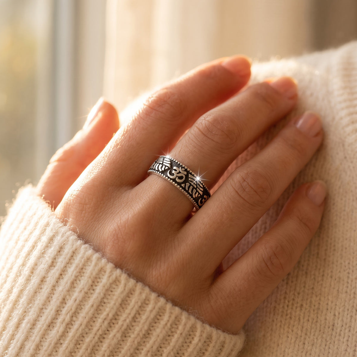 Sterling Silver Bali Carved Om Ring worn, lifestyle photo