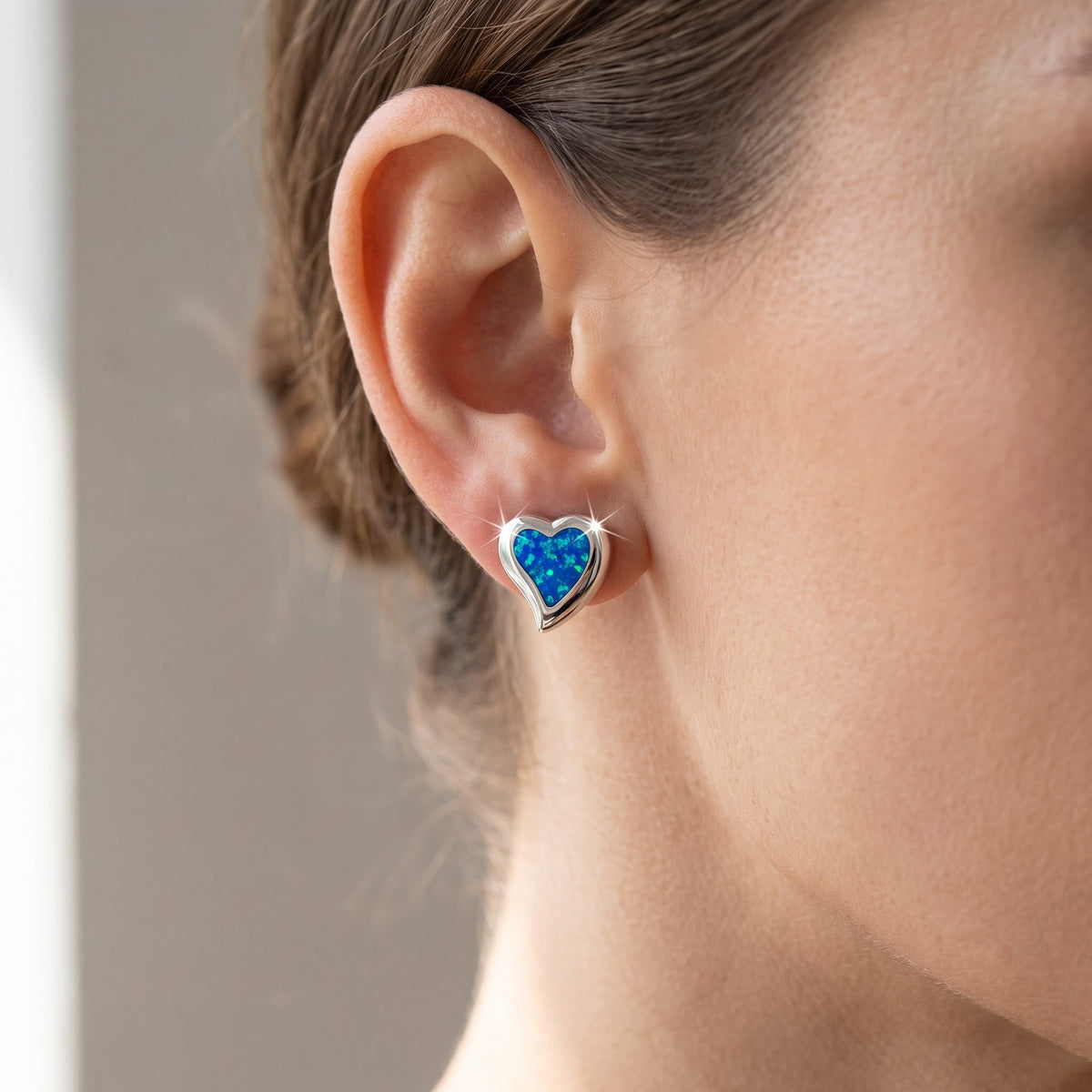 Sterling Silver Blue Created Opal Heart Stud Earrings, 12mm worn, lifestyle photo