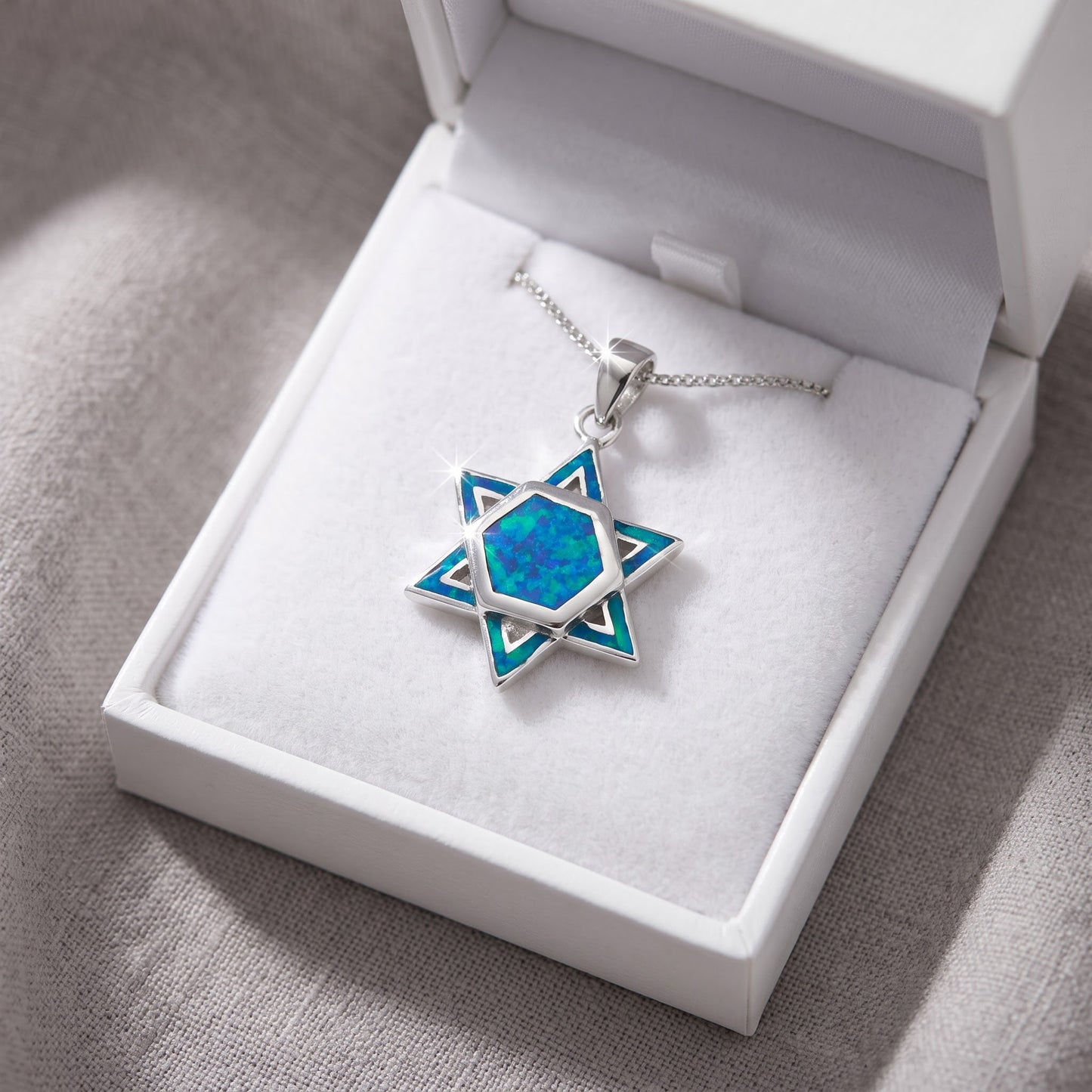 Sterling Silver Blue Created Opal Jewish Star (star of david) Necklace - 24mm in a white gift box, ready to give