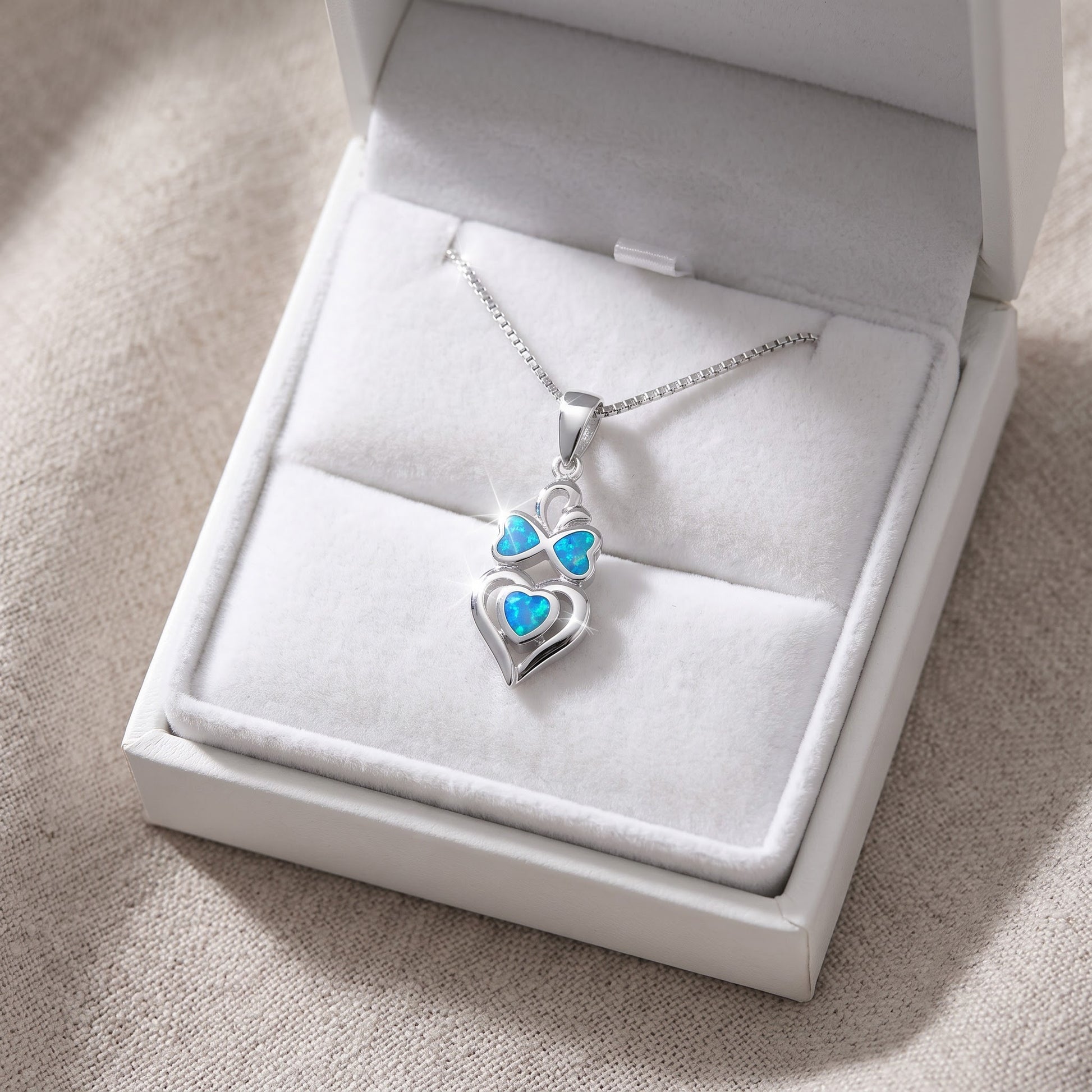 Sterling Silver Blue Created Opal Owl Heart Necklace, 20mm in a white gift box, ready to give