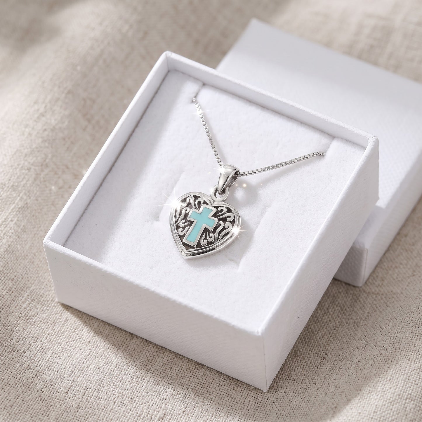 Sterling Silver Blue Enamel Celtic Cross Heart Necklace in a white gift box, ready to give