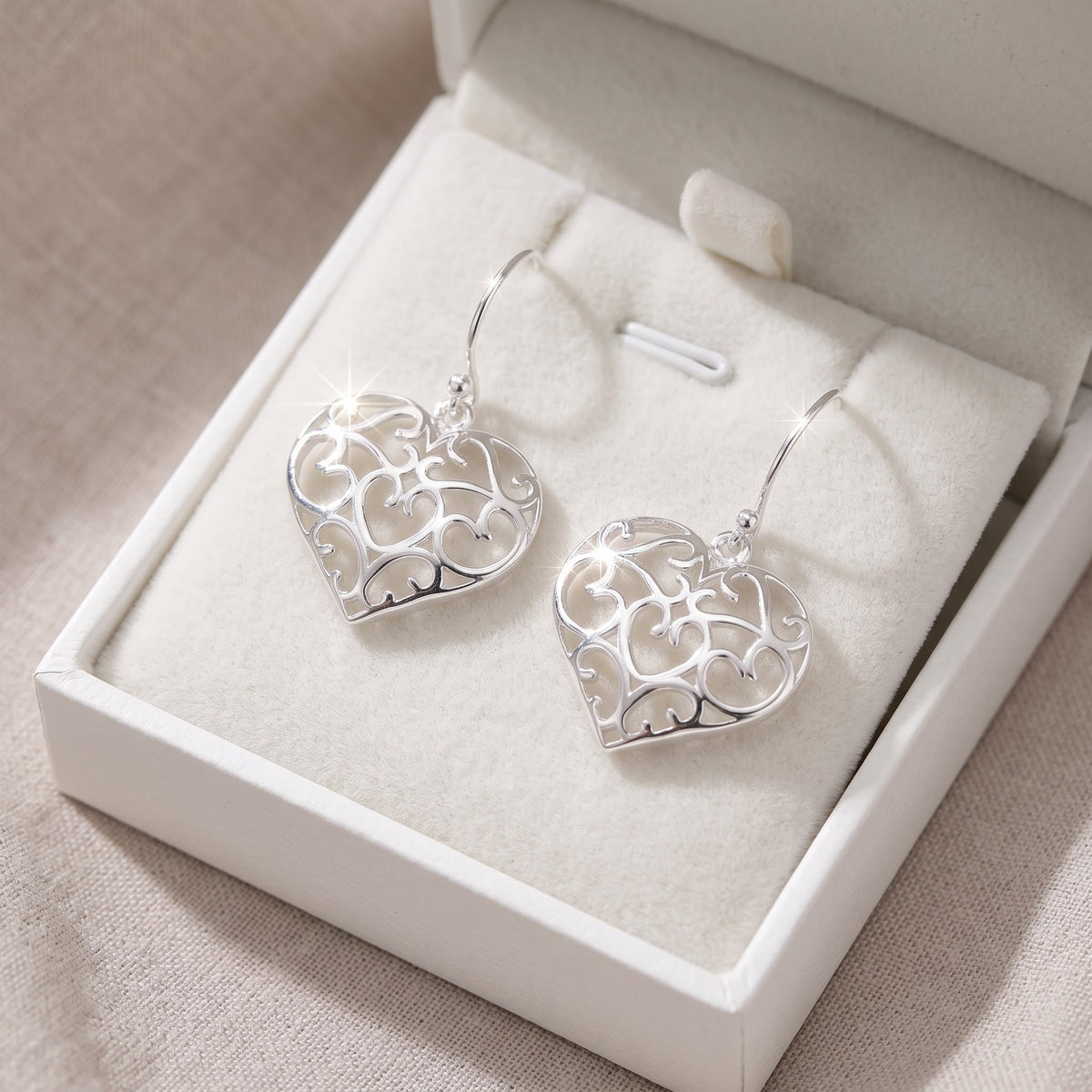 Sterling Silver Ladies Retro Filigree Heart Fish Hook Dangle Earrings in a white gift box, ready to give