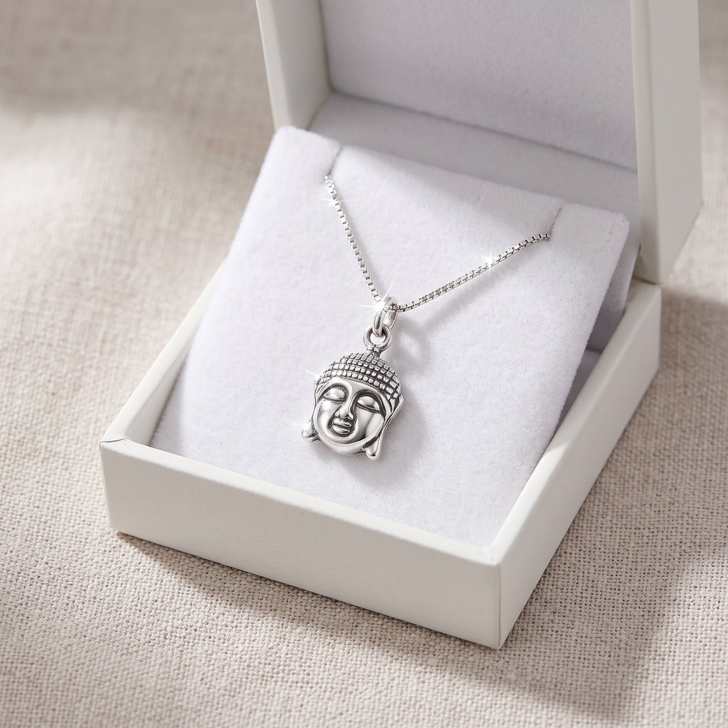 Sterling Silver Buddha Head Charm Necklace, 18" in a white gift box, ready to give
