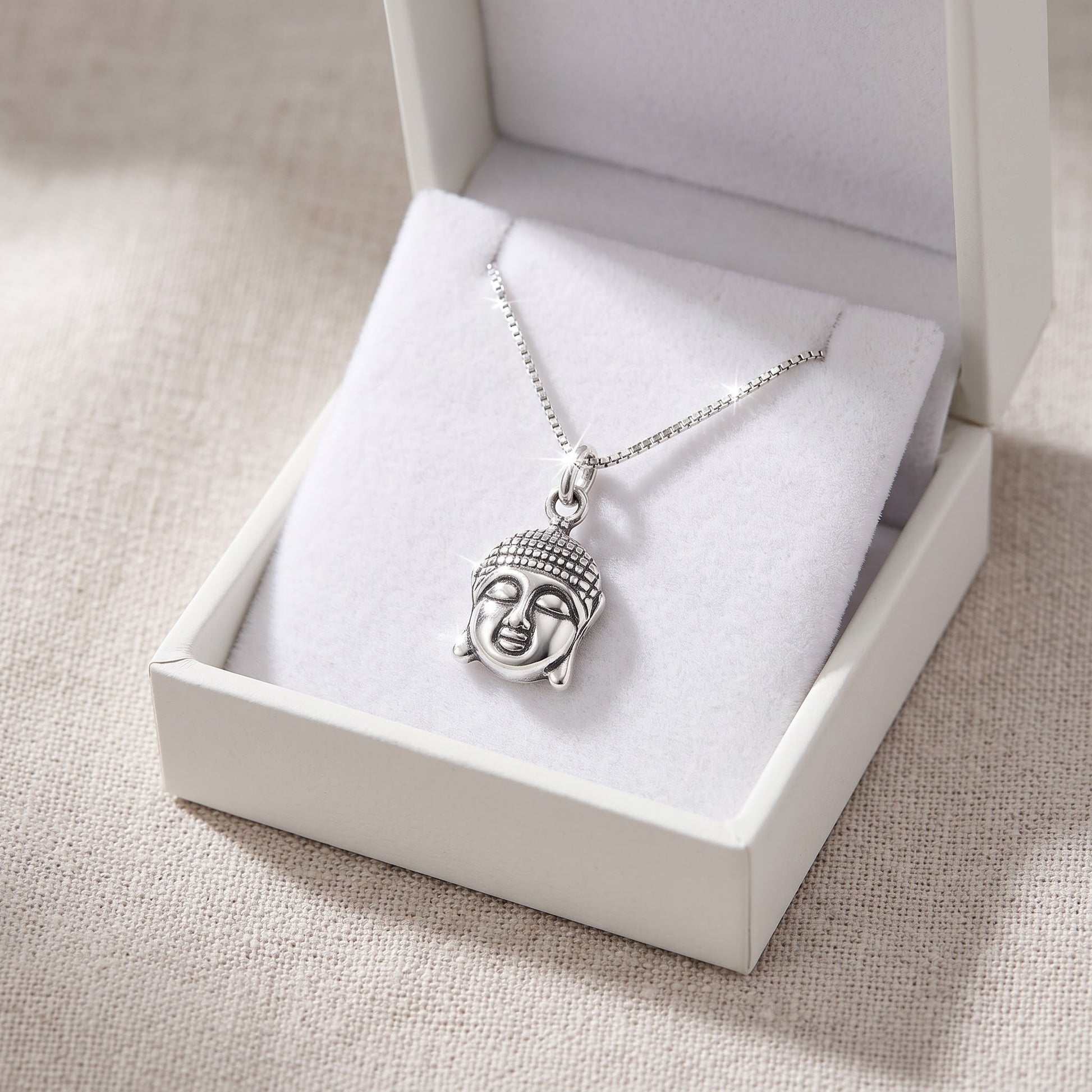Sterling Silver Buddha Head Charm Necklace, 18" in a white gift box, ready to give