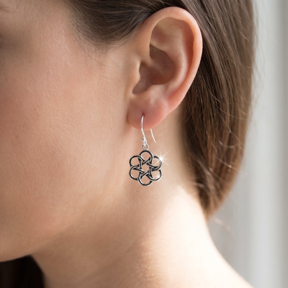 Sterling Silver Celtic Flower Dangle Earrings worn, lifestyle photo