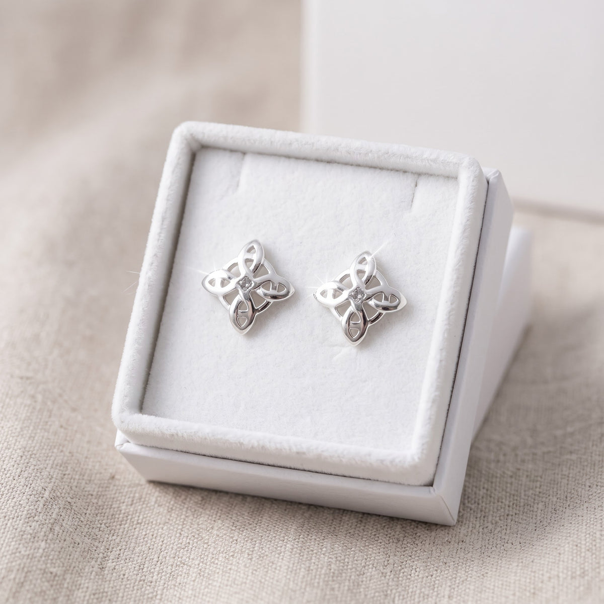 Sterling Silver Girls Celtic Knot Stud Earrings, 0.35" in a white gift box, ready to give