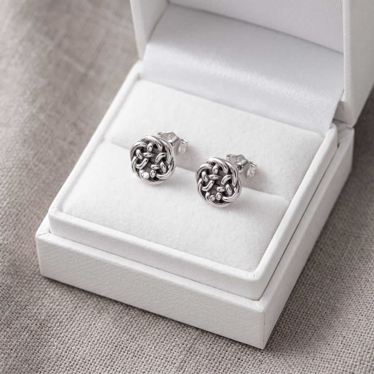 Rhodium-Plated Sterling Silver Women's Small Antrim Knot Celtic Stud Earrings in a white gift box, ready to give
