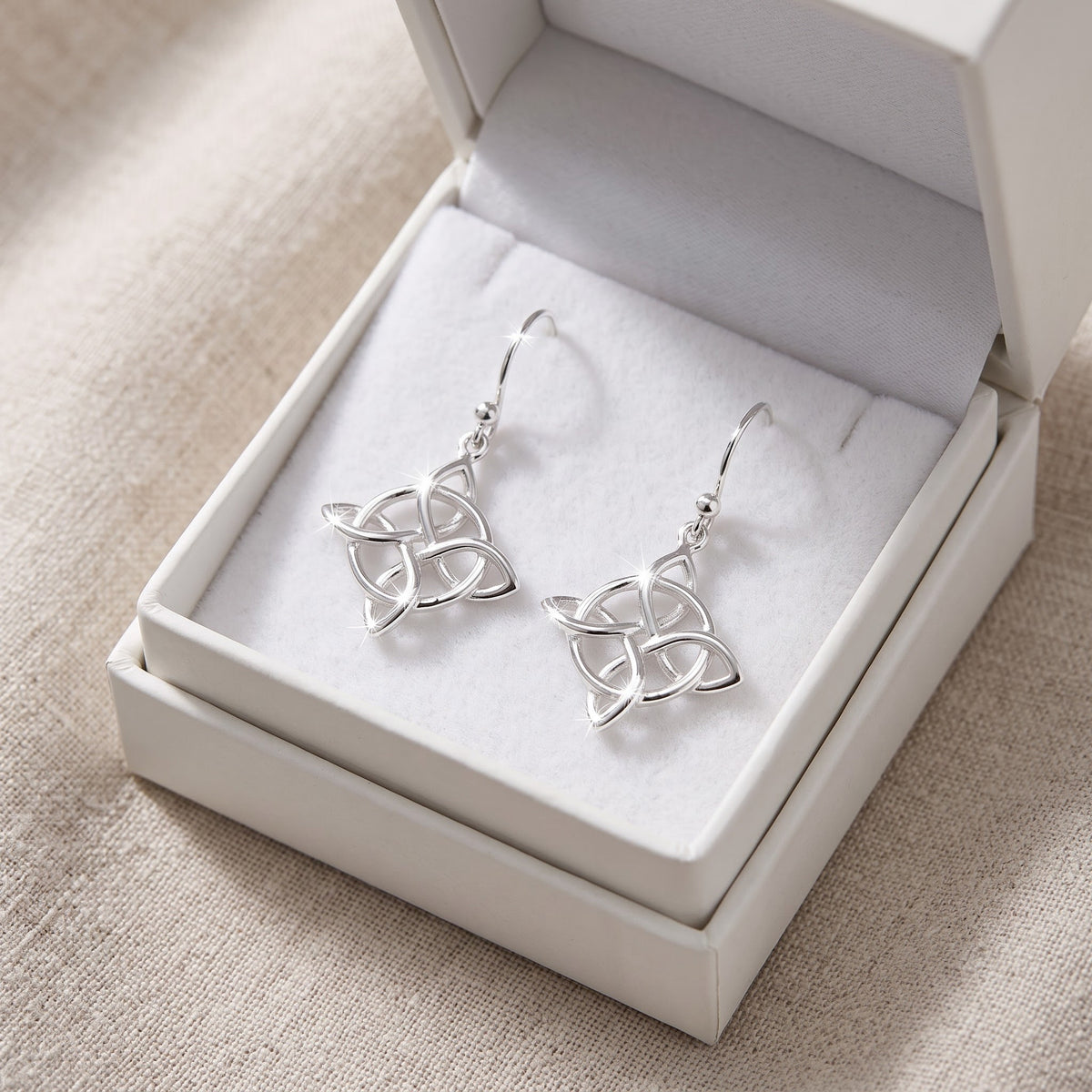 Sterling Silver Celtic Triquetra Drop Earrings in a white gift box, ready to give