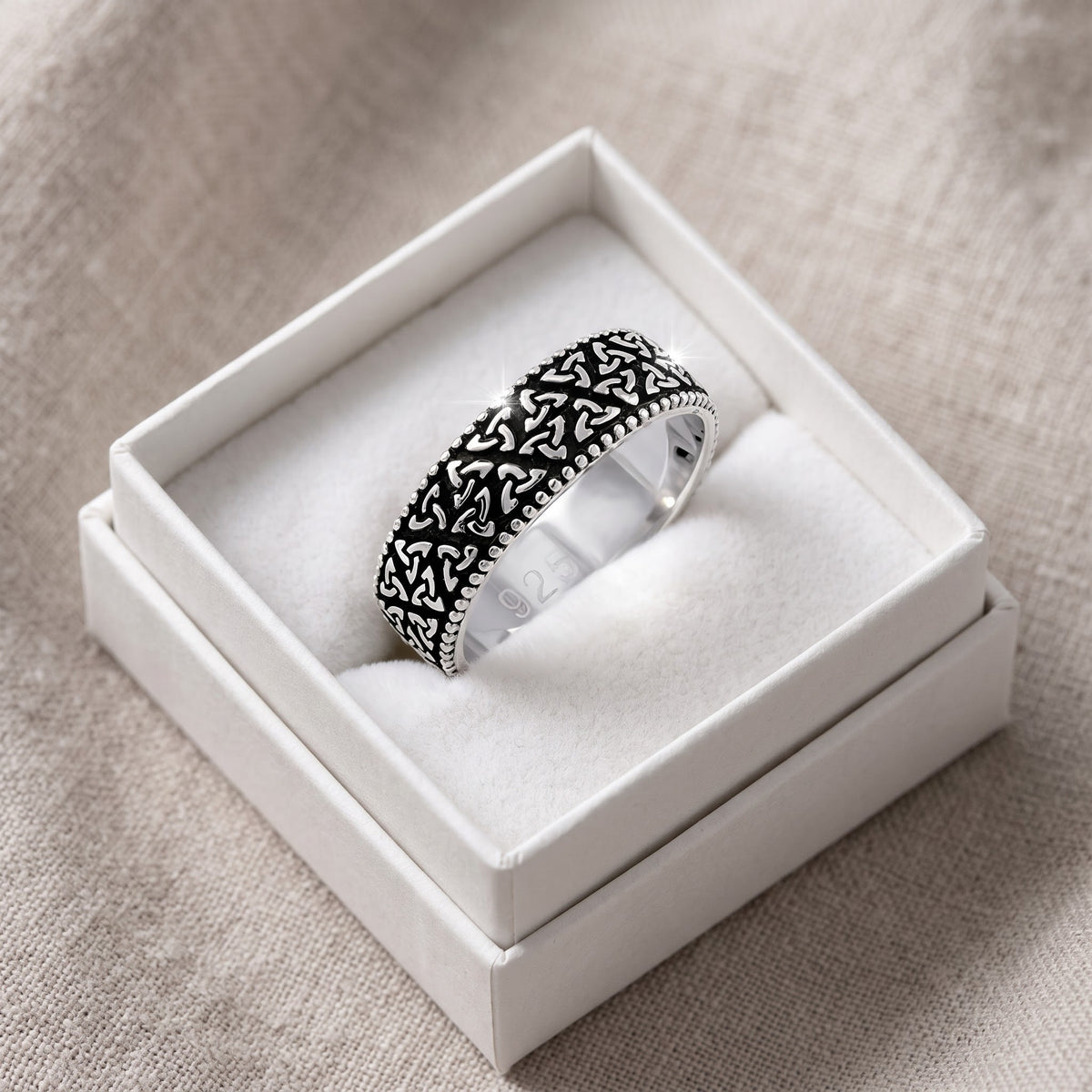 Sterling Silver Celtic Triquetra Eternity Ring in a white gift box, ready to give
