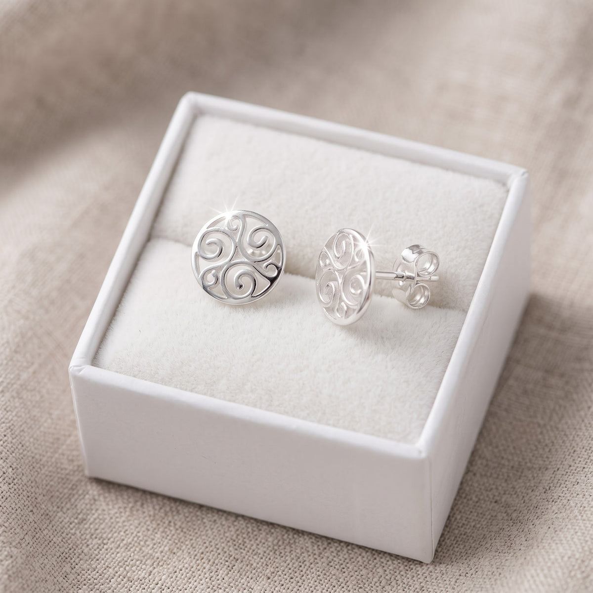 Sterling Silver Celtic Triskelion Stud Earrings - 8mm in a white gift box, ready to give