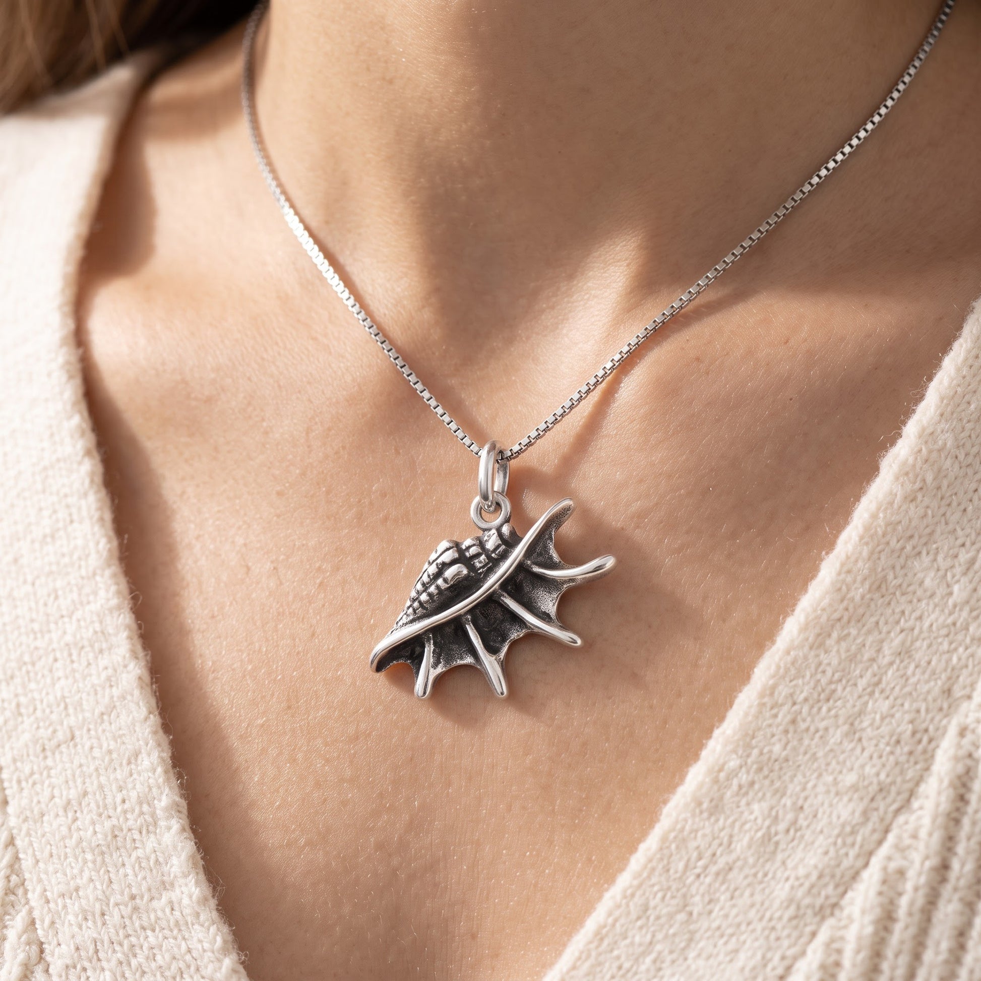 Sterling Silver Conch Shell Necklace, 18" worn, lifestyle photo