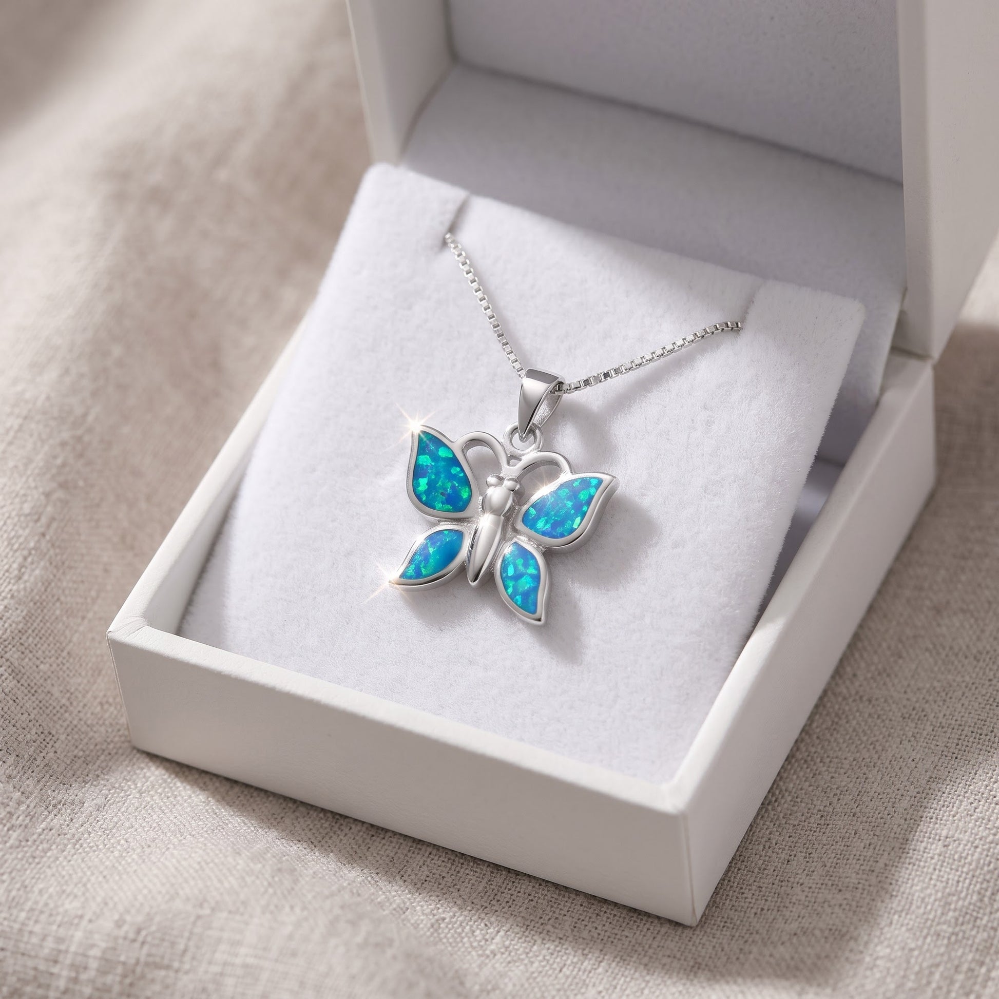 Sterling Silver Created Blue Opal Butterfly Necklace, 18mm in a white gift box, ready to give