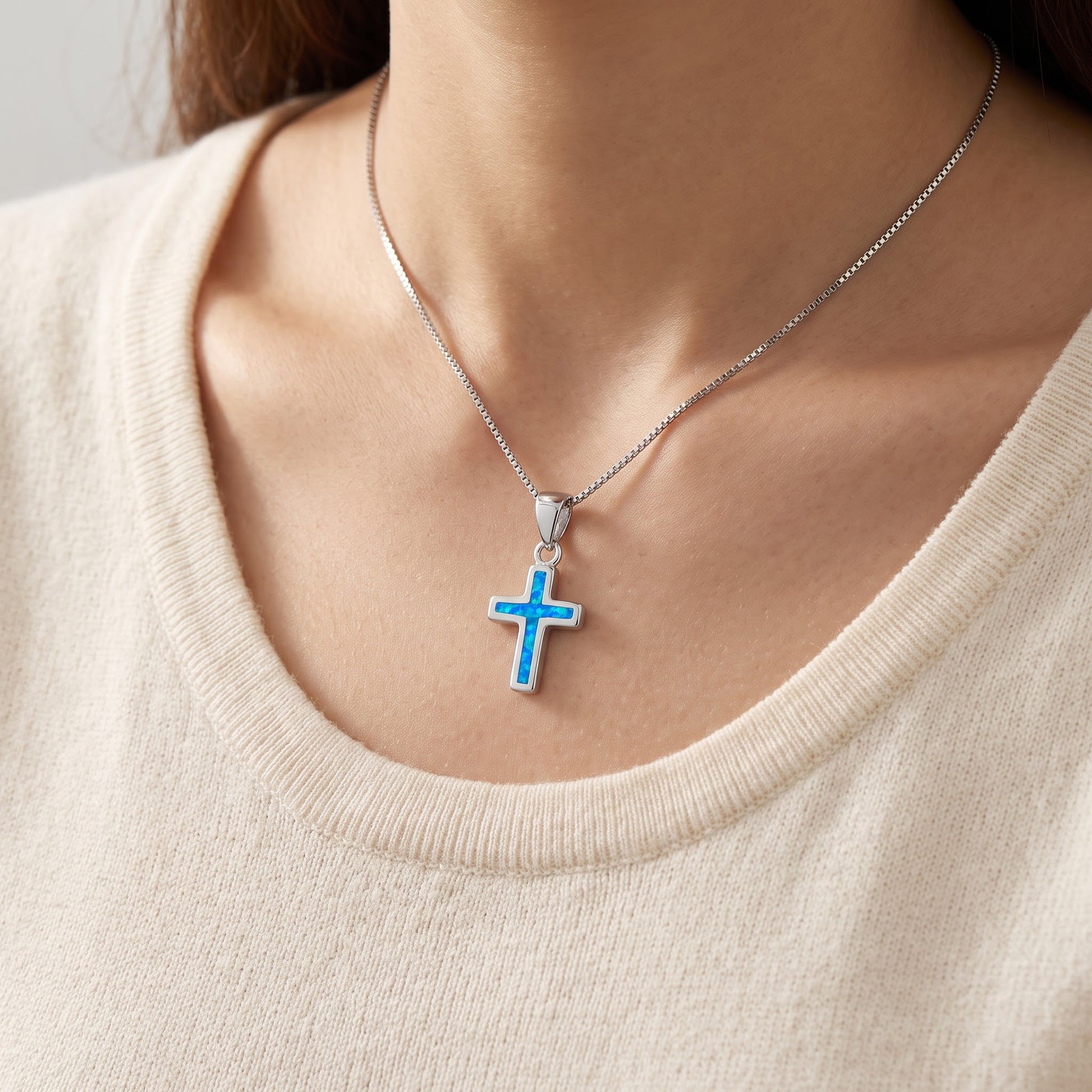 Sterling Silver Created Blue Opal Cross Necklace, 18" worn, lifestyle photo