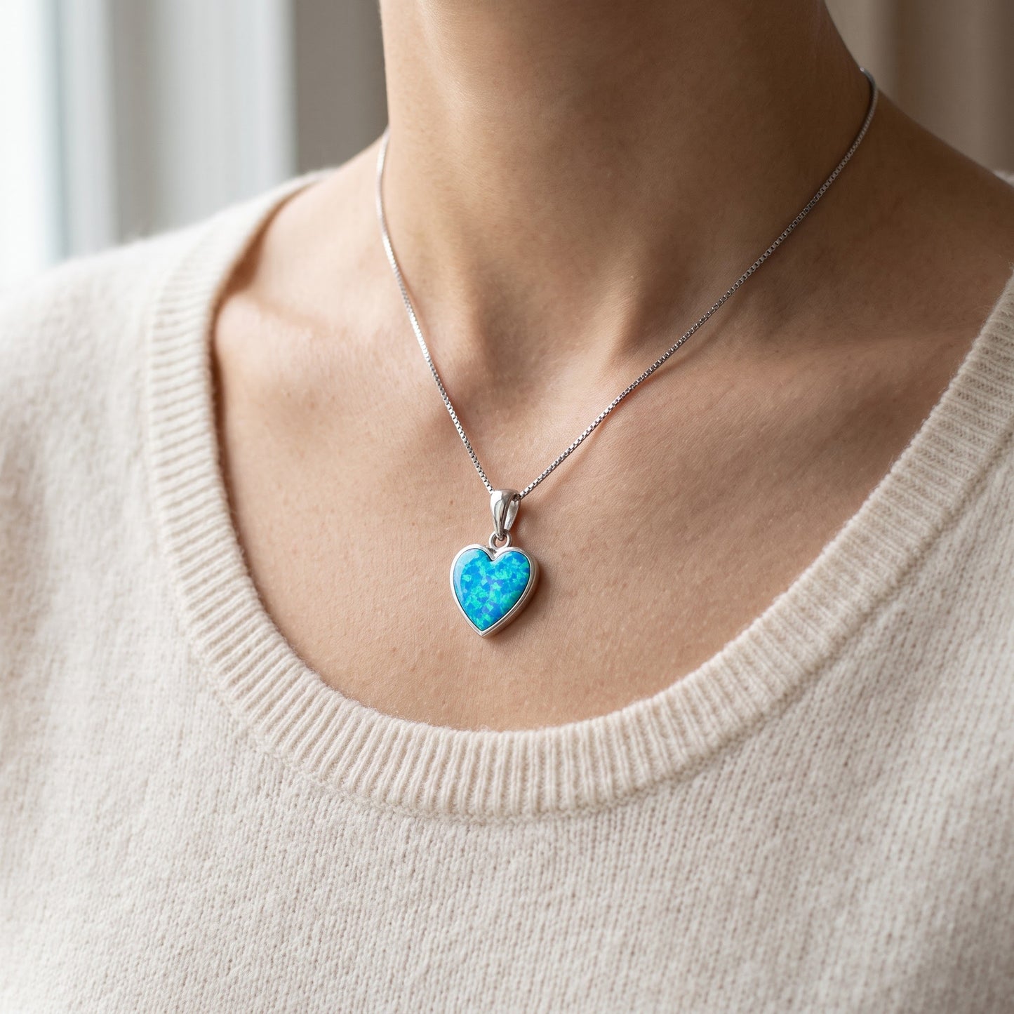 Sterling Silver Created Blue Opal Heart Necklace worn, lifestyle photo