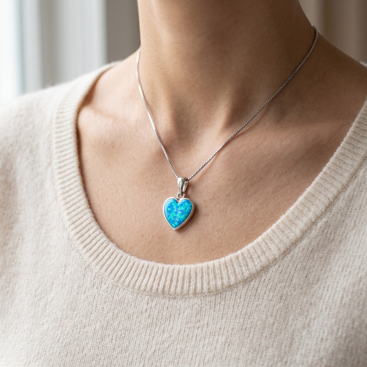 Sterling Silver Created Blue Opal Heart Necklace worn, lifestyle photo