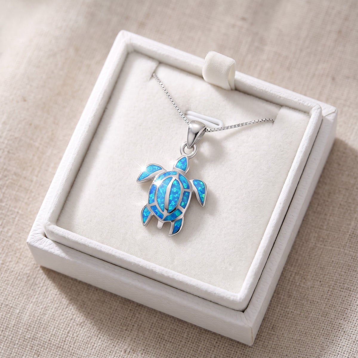 Sterling Silver Created Blue Opal Kemps Turtle Necklace - 20mm in a white gift box, ready to give