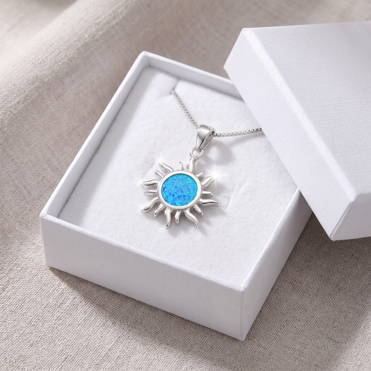 Sterling Silver Created Blue Opal Sunshine Necklace, 18" in a white gift box, ready to give