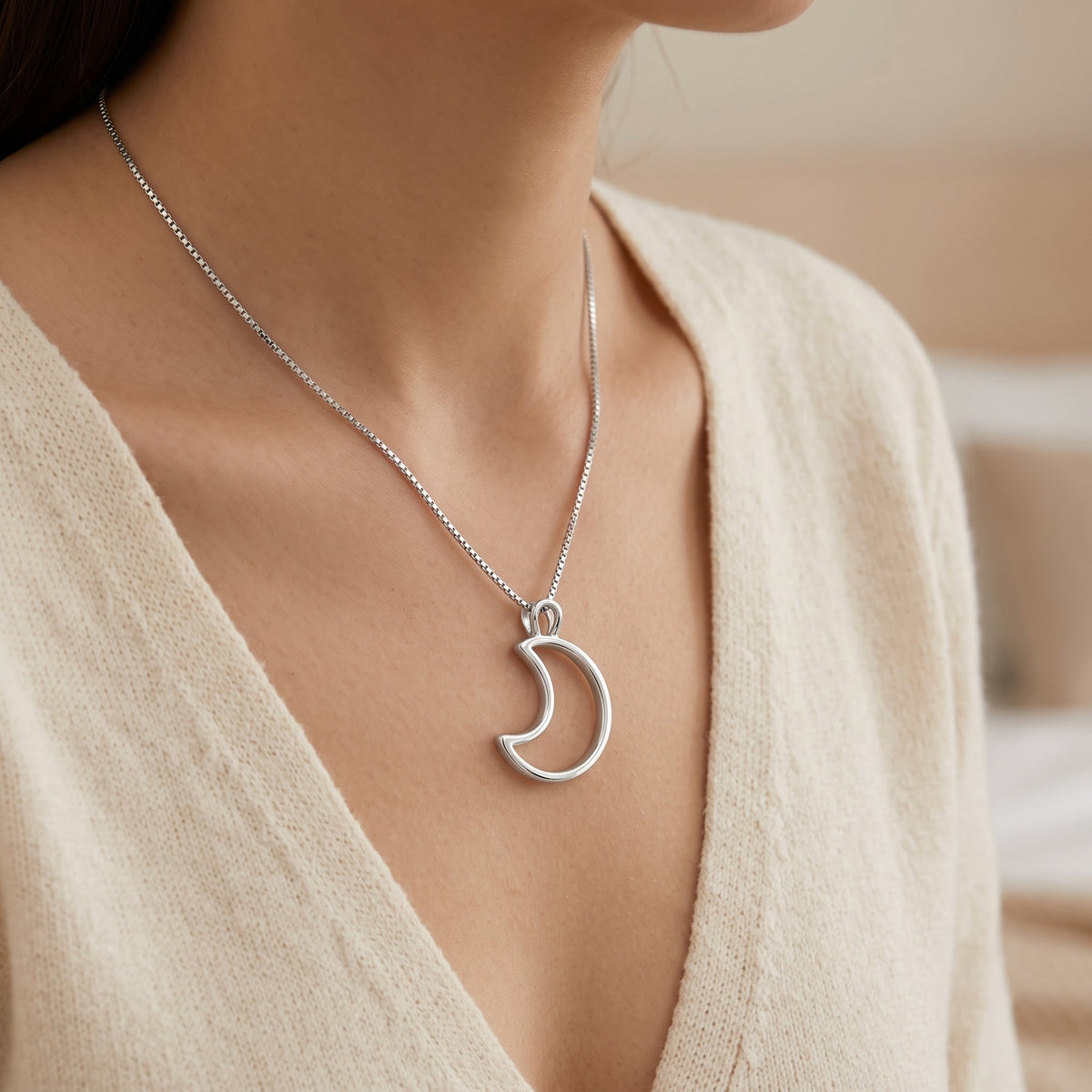 Sterling Silver Crescent Moon Necklace worn, lifestyle photo