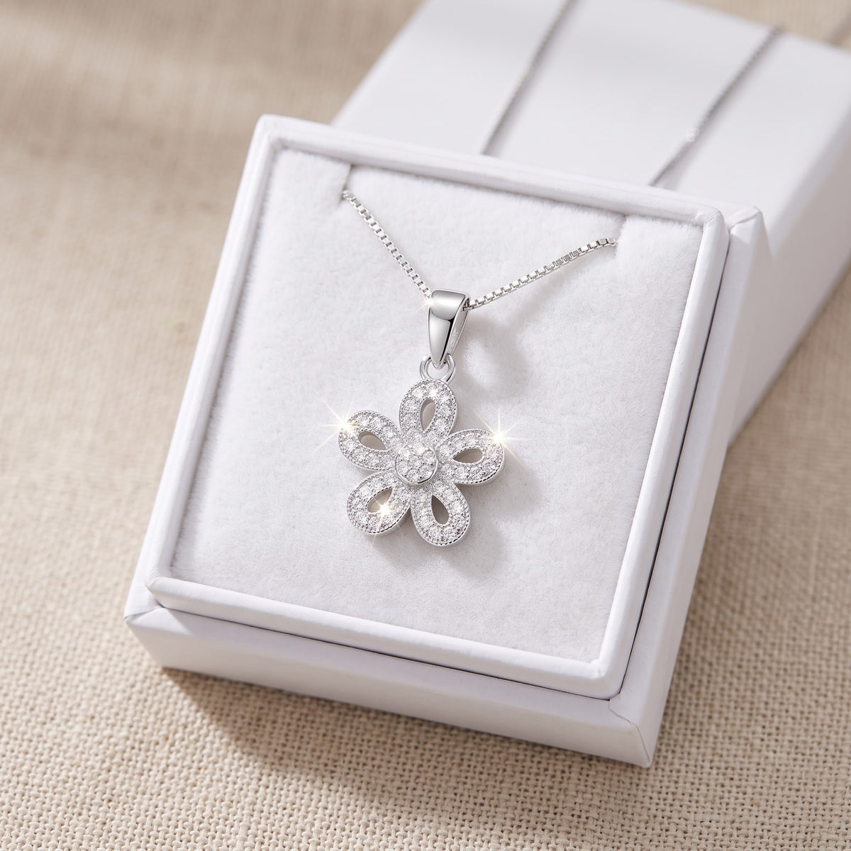 Sterling Silver CZ Daisy Flower Charm Necklace, 18" in a white gift box, ready to give