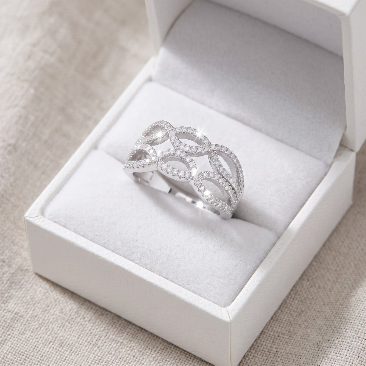 Sterling Silver CZ Double Twisted Braid Ring in a white gift box, ready to give