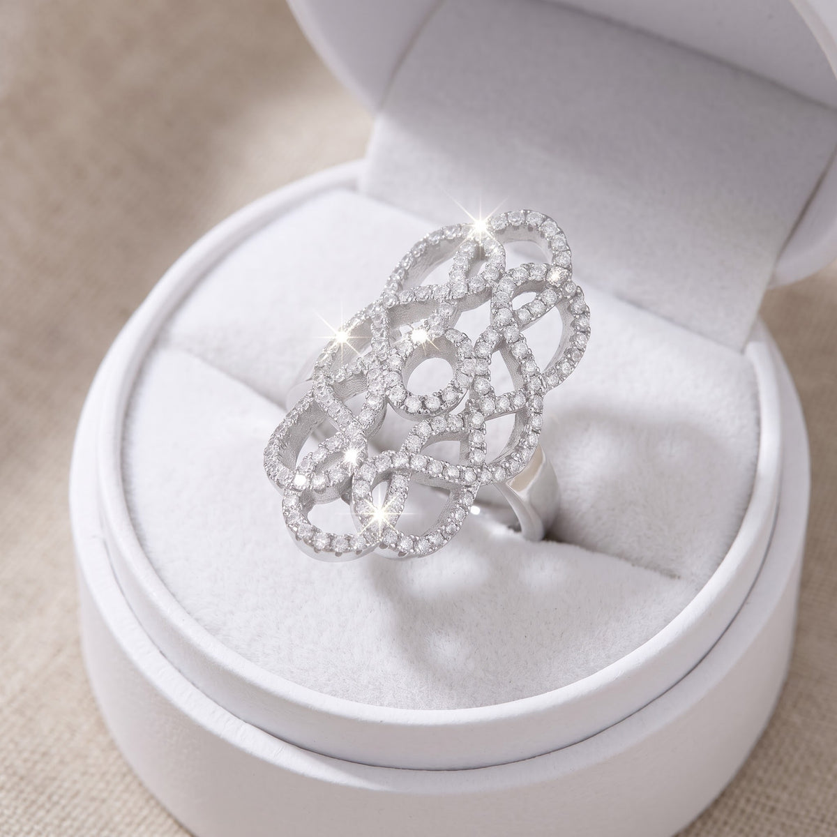 Sterling Silver CZ Filigree Armour Statement Ring in a white gift box, ready to give