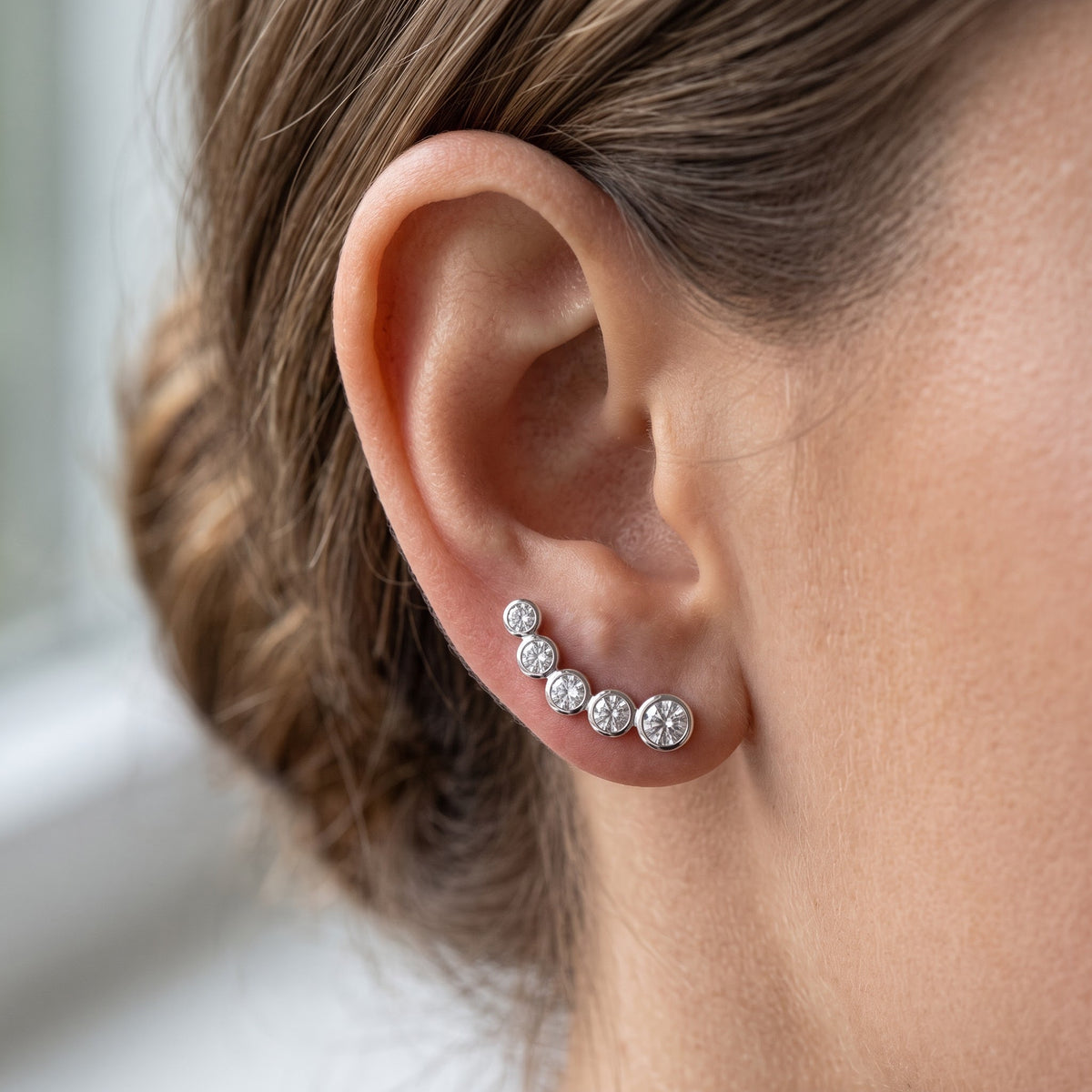 Sterling Silver CZ Half Ear Crawler Stud Earrings worn, lifestyle photo
