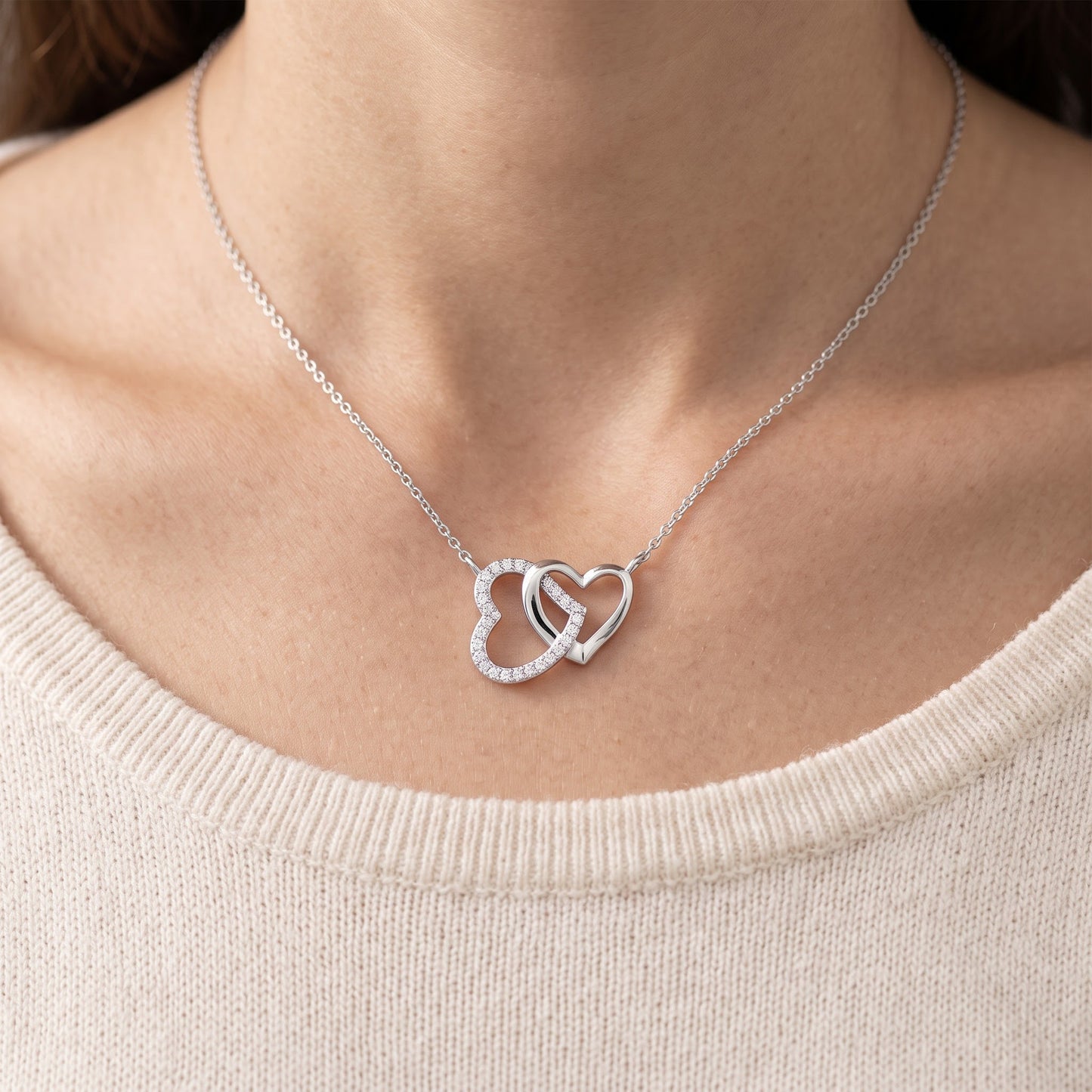 Sterling Silver CZ Interlocking Hearts Necklace, 18" worn, lifestyle photo