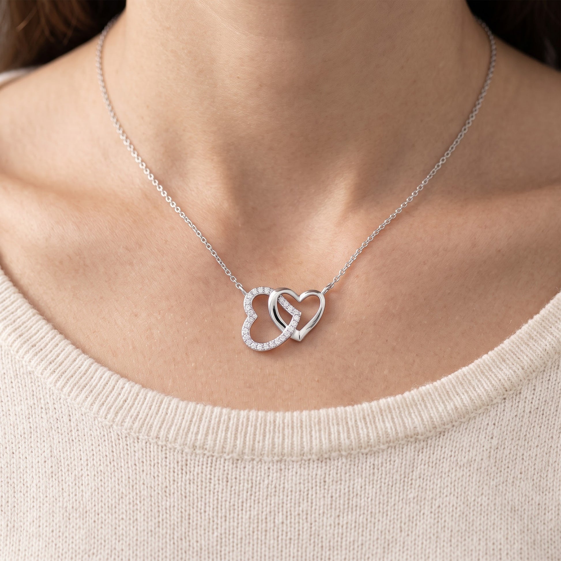Sterling Silver CZ Interlocking Hearts Necklace, 18" worn, lifestyle photo