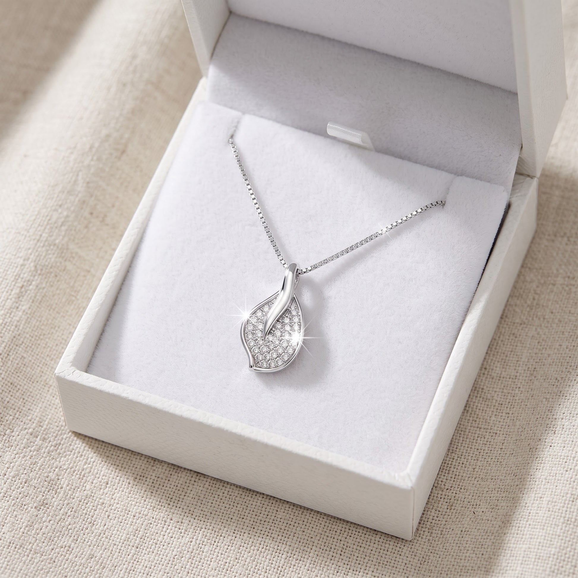 Sterling Silver CZ Leaf Charm Necklace, 18" in a white gift box, ready to give