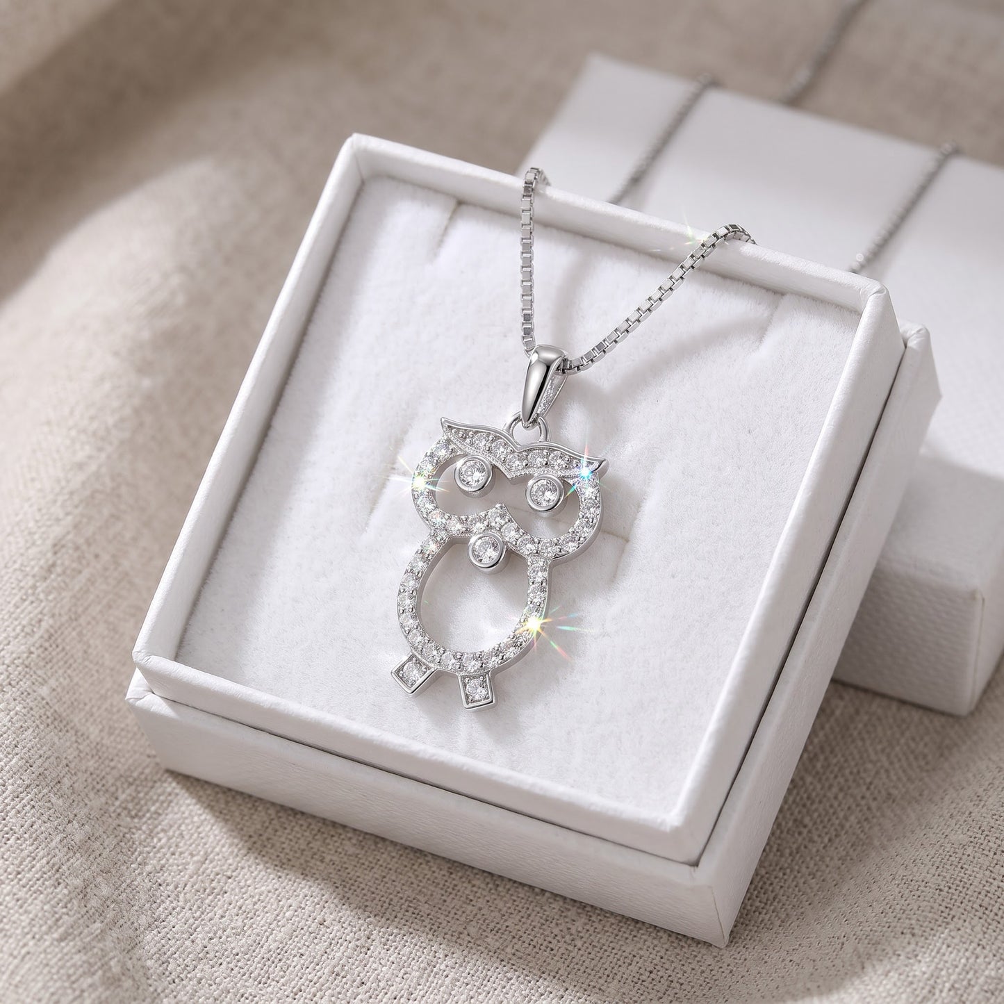 Sterling Silver CZ Owl Necklace in a white gift box, ready to give
