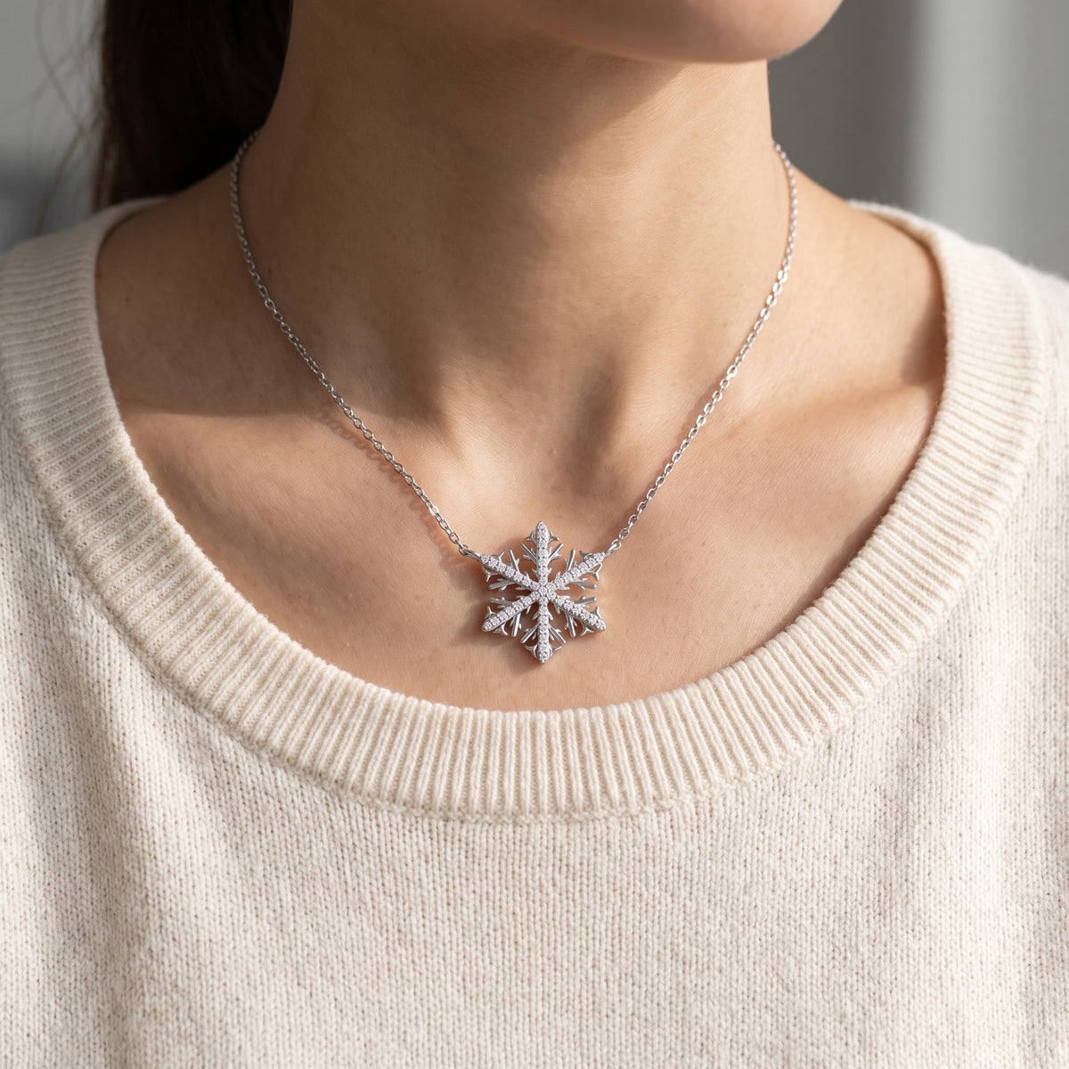 Sterling Silver CZ Snowflake Necklace worn, lifestyle photo