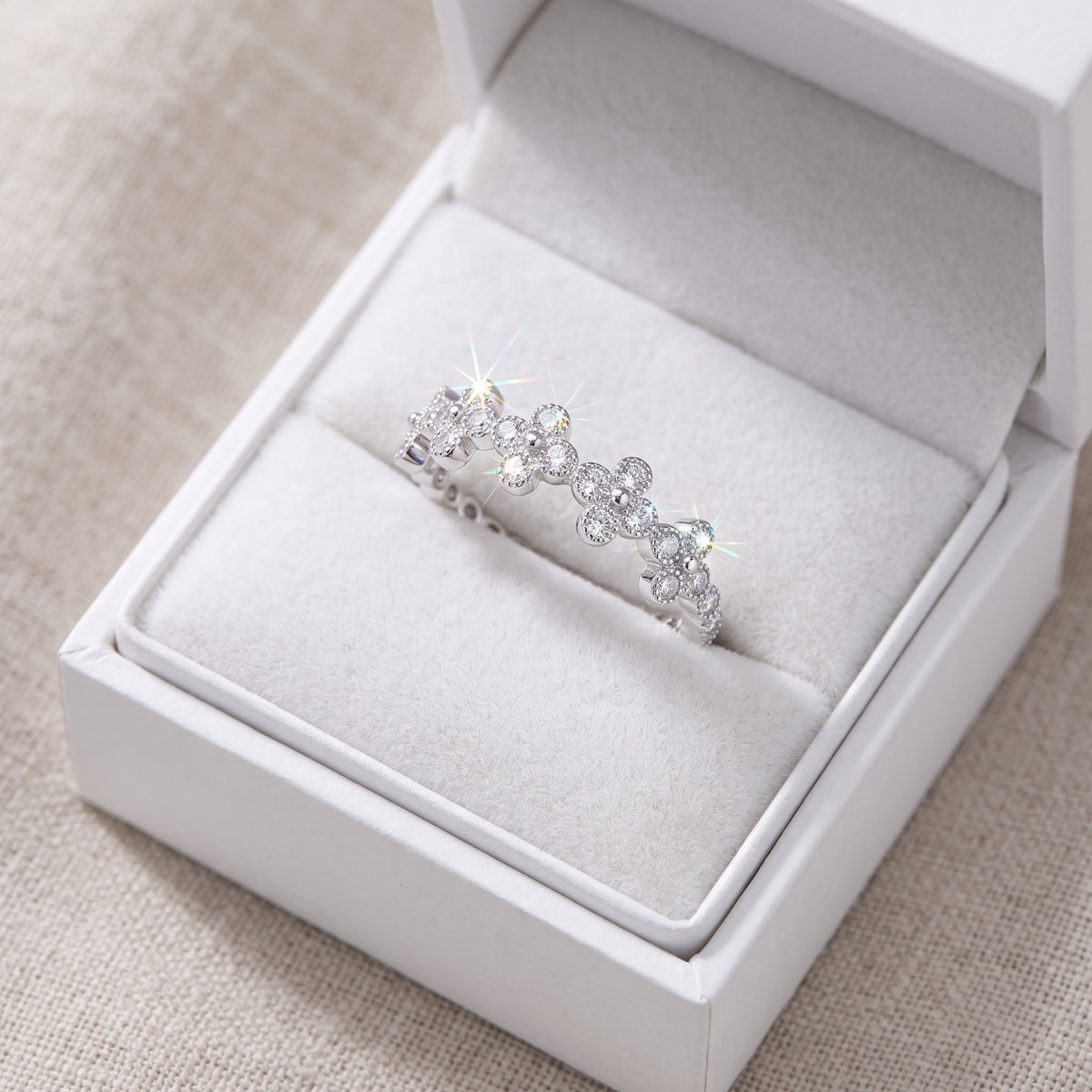 Sterling Silver CZ Stackable Cross Ring in a white gift box, ready to give