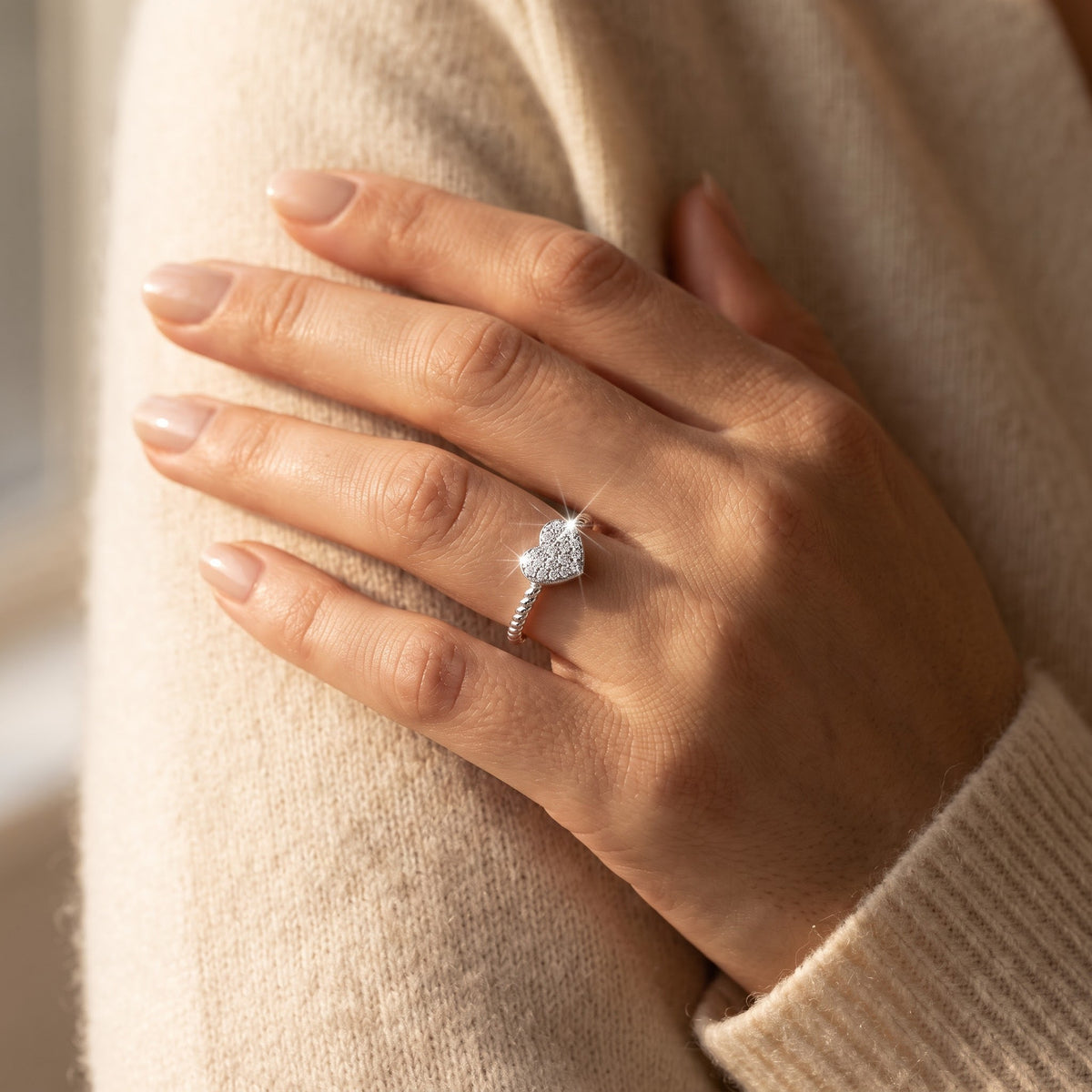 Sterling Silver CZ Stackable Rope Heart Ring worn, lifestyle photo